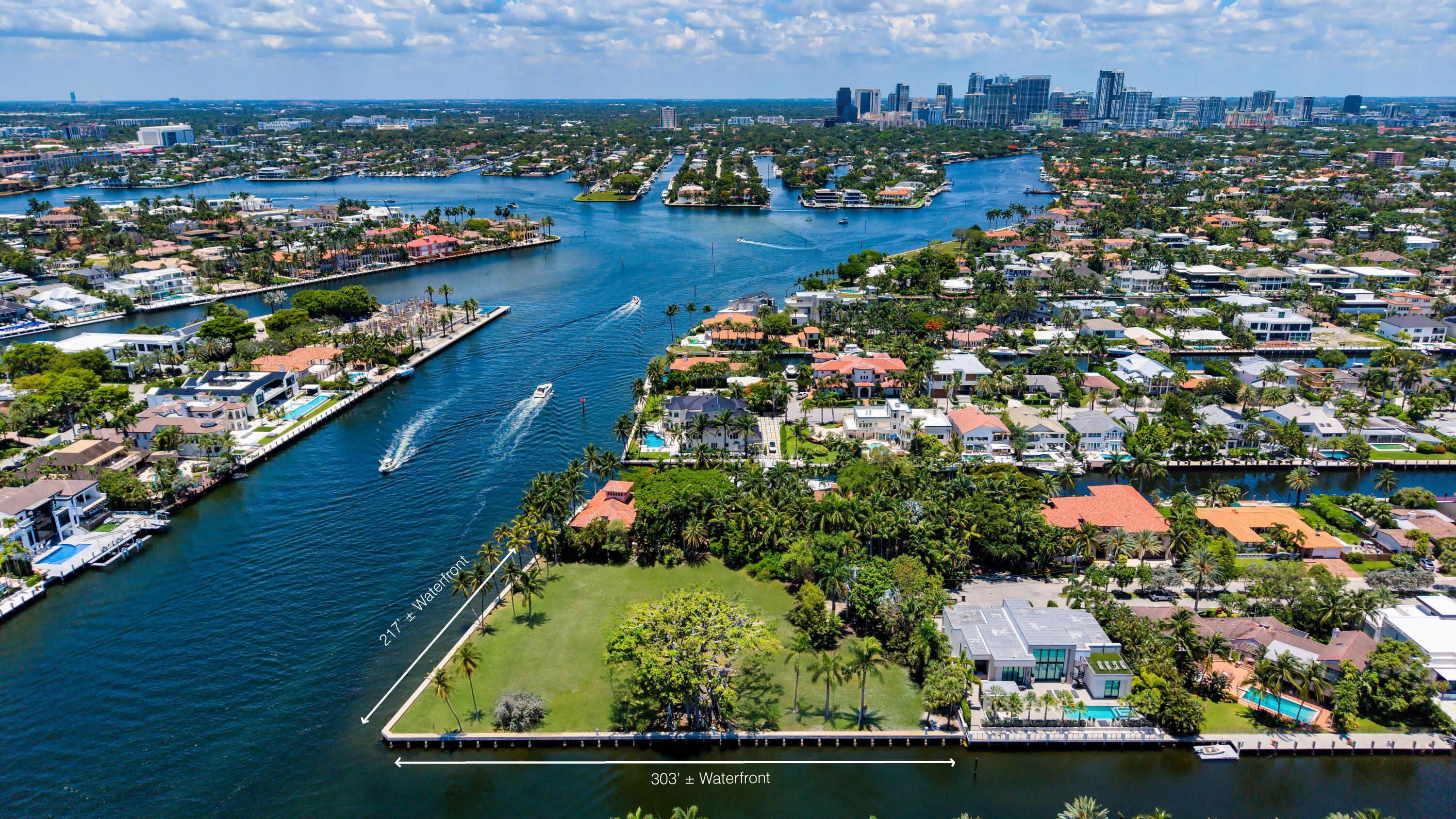 "Banyan Point Estate" located off prestigious Las Olas Blvd. in the guarded Riviera Isles waterfront enclave and sited-on 1.21+/- acres of vacant deepwater point lot with amazing 520 +/-feet of frontage (303+/- ft of protected mega-yacht side dockage) on the Rio Idlewyld Canal and New River/Intracoastal Waterway, minutes to Port Everglades Inlet via Atlantic Ocean. Once owned by the famed Anheuser-Busch family, this iconic point lot cannot be replicated at this price. This Billionaire's Point is ready to build your dream estate with stately main manor house, guest/carriage house, auto salon/gallery and sports/wellness wing and more. Proposed conceptional plans by Palm Beach builder Mark Timothy Luxury Homes and award-winning Affiniti Architects soon to be unveiled. Shown by appt only