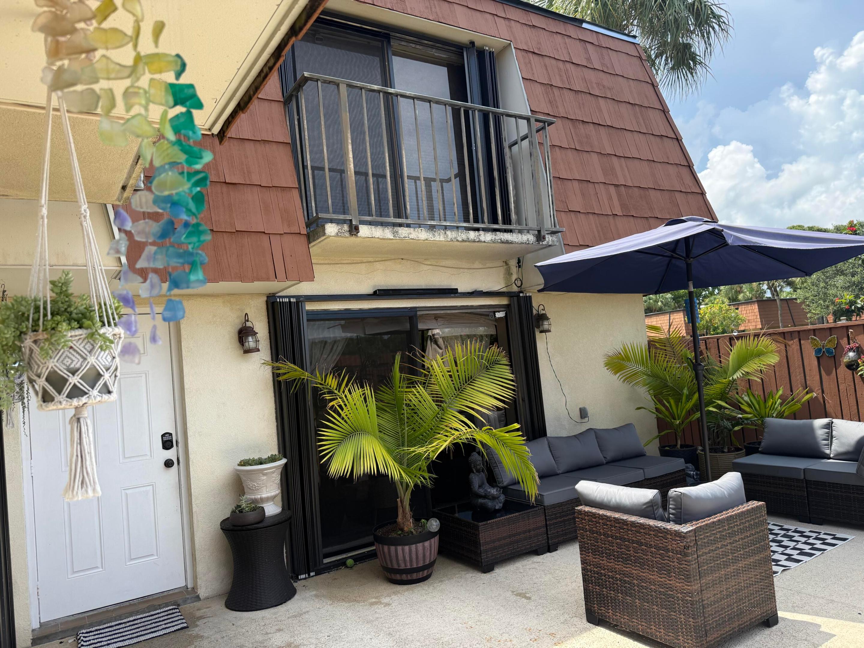 Rarely available WATERFRONT TOWNHOME !!  Welcome to this charming two-story townhouse in Chalet 4 3, located in Boynton Beach, Florida. This property features TWO ensuite bedrooms with gorgeous water views, remodeled kitchen, in unit laundry and two and a half recently updated bathrooms, offering comfortable living space across 1,264 square feet of finished area. The two-story layout provides excellent room separation and efficient use of space for modern living. This residence offers the unique advantage of water access that enhances both lifestyle and property value. This property presents an outstanding opportunity for those seeking a well-proportioned townhouse in a waterfront community.