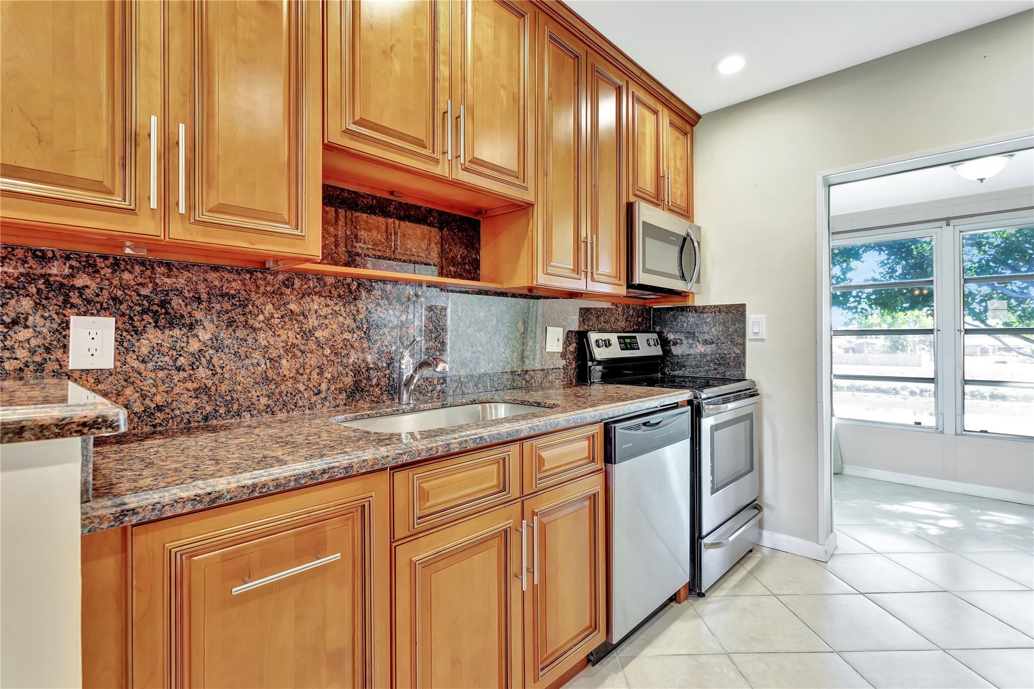 UNIQUE AND ONE OF A KIND BEAUTY! TURN KEY...JUST BRING YOUR SUITCASE. TOTALLY REMODELED! BRIGHT AND SPACIOUS 1 BEDROOM WITH 1.5 BATHS. CUSTOM BUILT CABINETRY FOR YOUR OVER SIZED KITCHEN WITH EXTRA EATING AREA TO ENJOY THE SERENE WATER VIEWS ALL DAY LONG! BEAUTIFUL GRANITE COUNTER TOPS AND APPLIANCES. TILED THROUGH OUT CONDO. MASTER BEDROOM FEATURES EXTENDED LIVING AREA WITH A SITTING AREA OR PRIVATE OFFICE FOR YOUR COMFORT, 2 MARTHA STEWART CLOSET BUILT-INS. MASTER BATH UPDATED WITH A SIT IN SHOWER ALONG WITH GRAB BARS. UPGRADED TO THE MAX! ASSOCIATION STATES 55+ COMMUNITY, MUST SHOW $40,000 INCOME, 700 CREDIT SCORE AND 6 MONTH SECURITY DEPOSIT REQUIRED. GREAT ACTIVE COMMUNITY OFFERS POOL, BUNCO, SHUFFLEBOARD TOURNAMENTS, EXERCISE ROOM, BILLIARDS PLUS MORE.