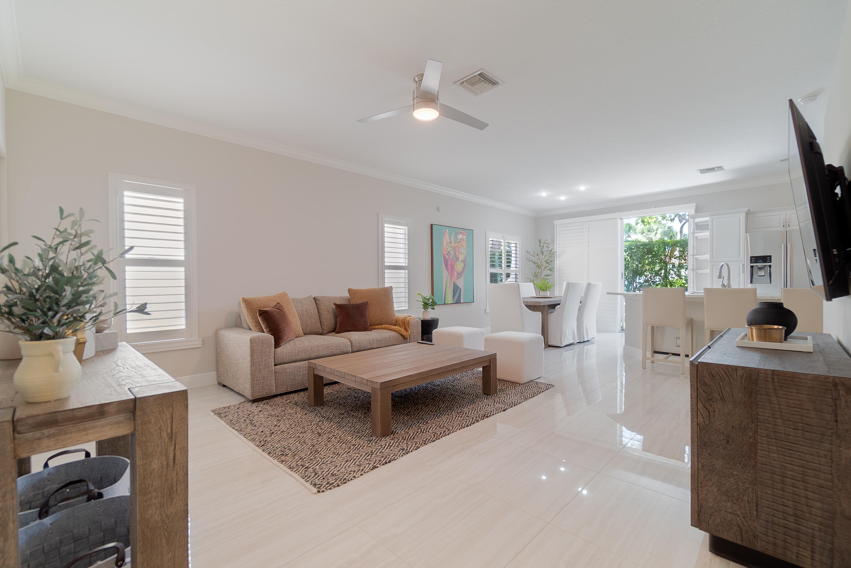 Ideally located in the heart of Wellington, this beautifully renovated 3-bedroom, 2-bathroom first-floor condo offers the perfect blend of comfort and convenience. The bright, open layout provides spacious living areas, while the private attached garage and driveway add rare practicality and privacy. Residents can enjoy Florida's sunshine at the community pool located just steps away, perfect for unwinding after a day of riding or enjoying Wellington's many outdoor activities. Ideally situated minutes from Wellington's world-renowned equestrian venues, shopping, dining, and major roadways, this property is a fantastic opportunity for equestrians, seasonal residents, or anyone looking to enjoy the Wellington lifestyle. A wonderful opportunity to enjoy easy living in one of Wellington's most sought-after equestrian destinations.