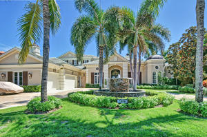 Located on a quiet street, this golf course home in Royal Palm Yacht & Country Club has one of the best views the community has to offer, overlooking 4 fairways (1st, 2nd, 3rd and 4th fairways) of the Jack Nicklaus Signature Golf Course. Built by Qualk Homes in 2001, this home has 5 bedrooms plus den, 6 full & 1 half bathrooms, 5,911 sqft under air, impact glass windows & doors and 3 car garage plus golf cart. 1st floor master suite features sitting area, his and her walk-in closets, his and her bathrooms and French doors leading to a covered patio area. Other features include gourmet kitchen w/ breakfast area, family room, billiard area w/ bar, summer kitchen, heated pool & spa, formal living room w/ fireplace, formal dining room w/ butler's pantry, and an upstairs loft area w/ sundeck.