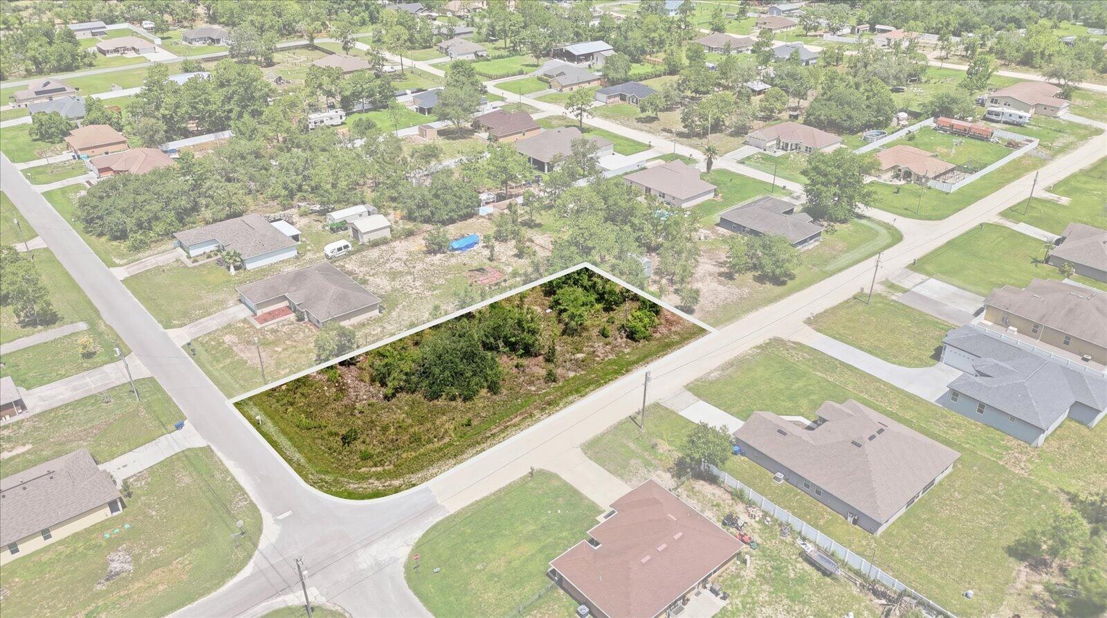 Discover the perfect place to build your Florida dream home on this beautiful corner lot in the growing Royal Highlands community of Weeki Wachee. Offering added flexibility for home design and access, this spacious homesite is ideally situated in a peaceful setting while still being just a short drive from shopping, restaurants, schools, medical facilities, and everyday conveniences.  Enjoy the best of Florida's Nature Coast with nearby Weeki Wachee Springs, parks, boating, fishing, kayaking, and the Gulf of Mexico, all within easy reach. Whether you're looking to build your forever home or invest in one of Hernando County's fastest-growing areas, this property offers an excellent opportunity with no HOA and plenty of room to make your vision a reality.
