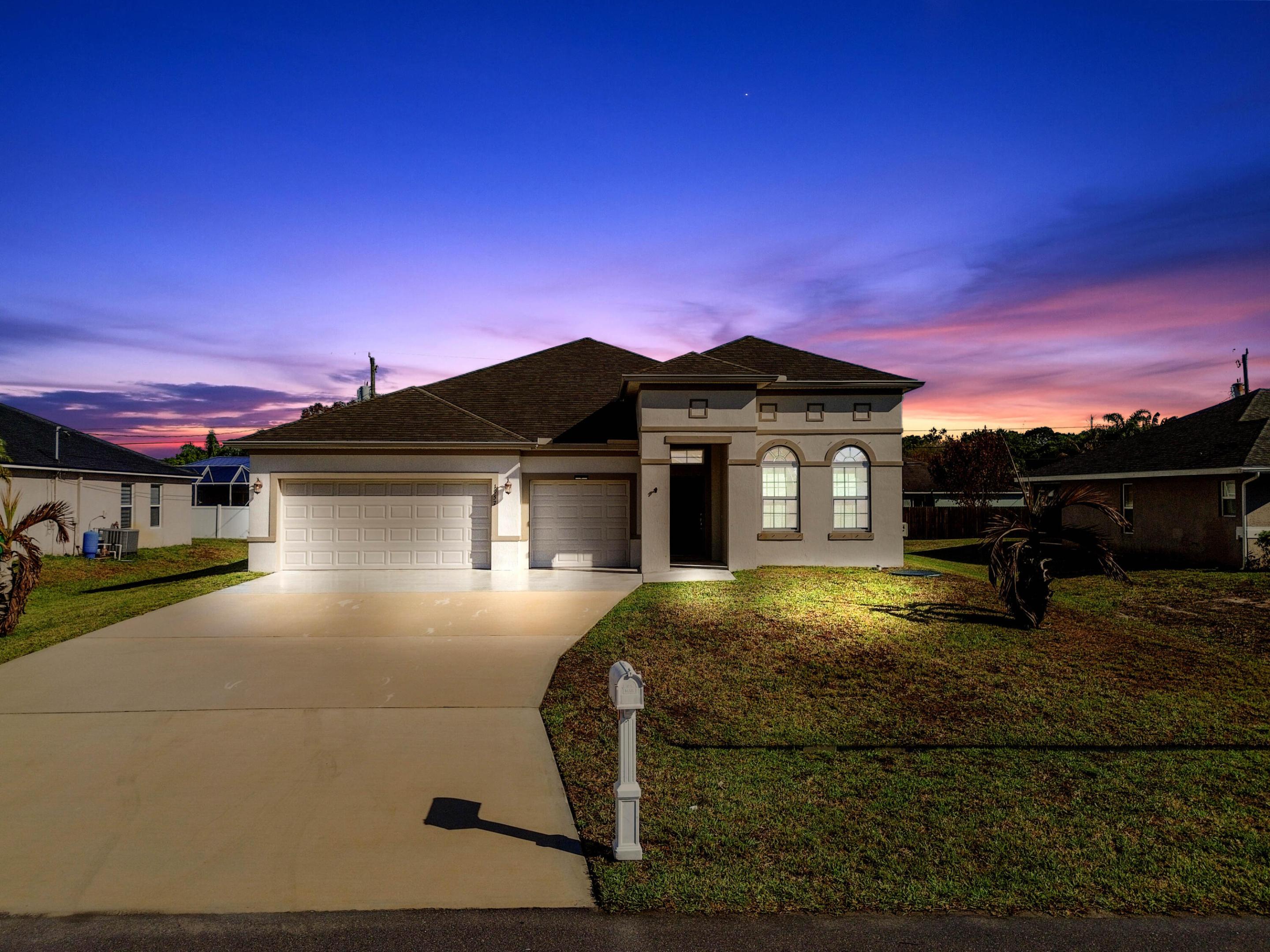 Discover this spacious 1-story home in Port Saint Lucie with no HOA, offering 2,361 sq ft of comfortable living space. This well-designed residence features 5 bedrooms and 3 bathrooms, perfect for accommodating family and guests. Step into a welcoming foyer that opens to the dining and living areas, ideal for everyday living and entertaining.  The gourmet kitchen is a standout, complete with a kitchen island, granite countertops with bar seating, stainless steel appliances, and ample cabinetry for storage. Enjoy indoor-outdoor living with a closed/screened patio overlooking a fully fenced backyard, offering privacy and plenty of space with potential to add a pool.  Don't miss the opportunity to own this versatile and inviting home in a desirable location!