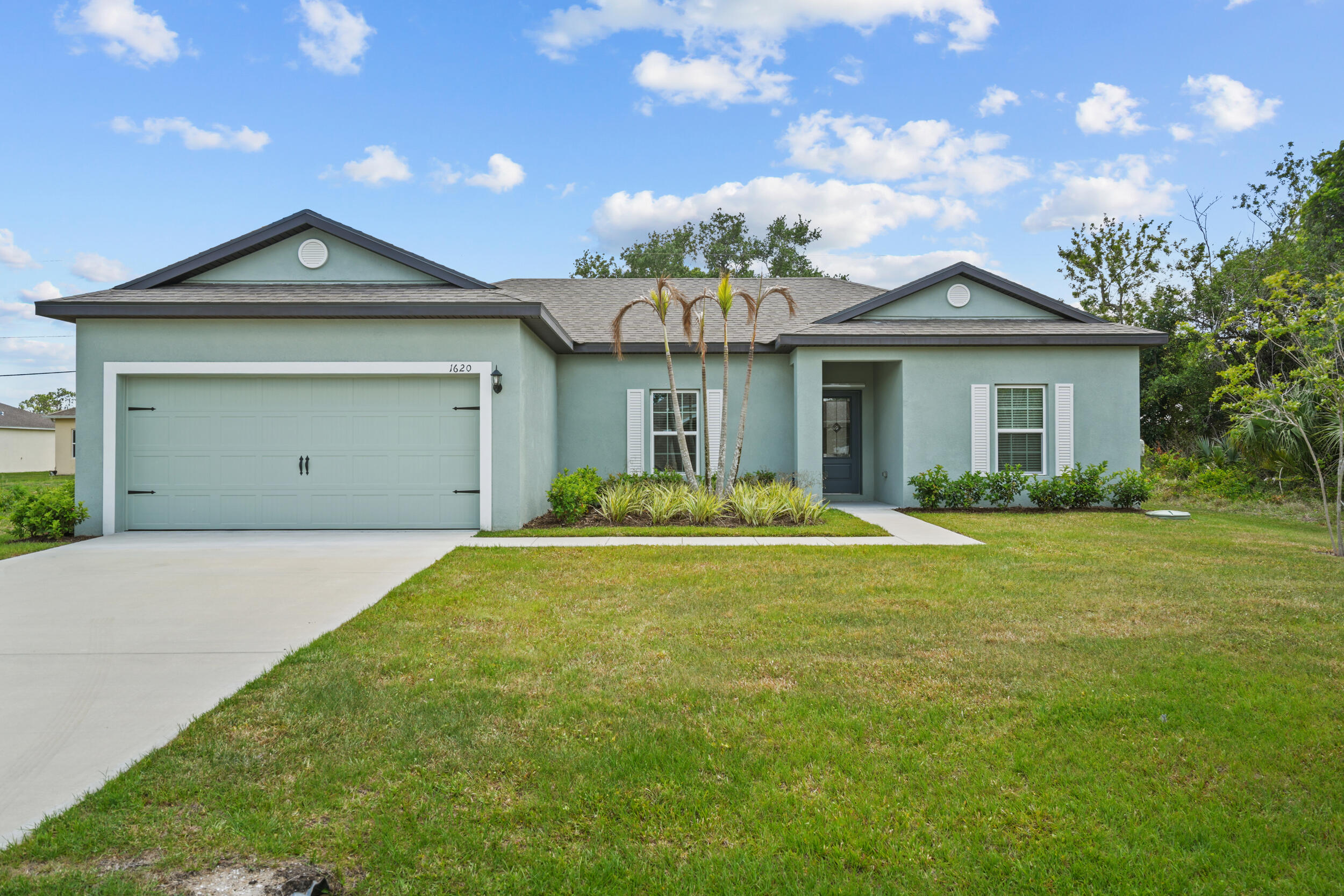 BRAND NEW CONSTRUCTION - NO HOA! Enjoy true Florida living in this beautiful new home in Port St. Lucie. No HOA fees or restrictions give you the freedom to personalize your property and lifestyle. Bright, open layout with a private backyard—perfect for relaxing, entertaining, or creating a safe and comfortable space for your pets. Ideally located minutes from I-95 and the desirable Tradition area, with easy access to top-rated shopping, dining, entertainment, and medical facilities—all in a peaceful neighborhood. Located in a fast-growing area with strong long-term value potential. Perfect as a primary home, vacation getaway, or investment opportunity. Don't miss this opportunity—schedule your showing today! Easy to show.