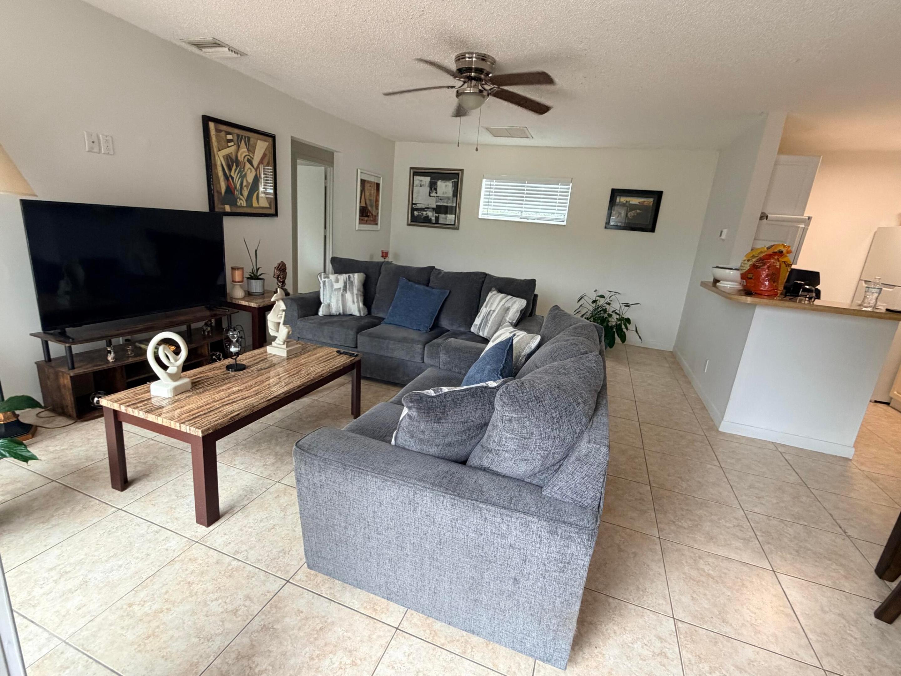 Beautiful and well-maintained 2-bedroom, 2 bath condo located in the desirable Crossing of Boynton Beach Community.  This bright and spacious unit features and open floor plan.  Enjoy community amenities including a swimming pool, tennis courts, clubhouse and scenic green spaces. Furnished option available for $2000 per month. No smoking.