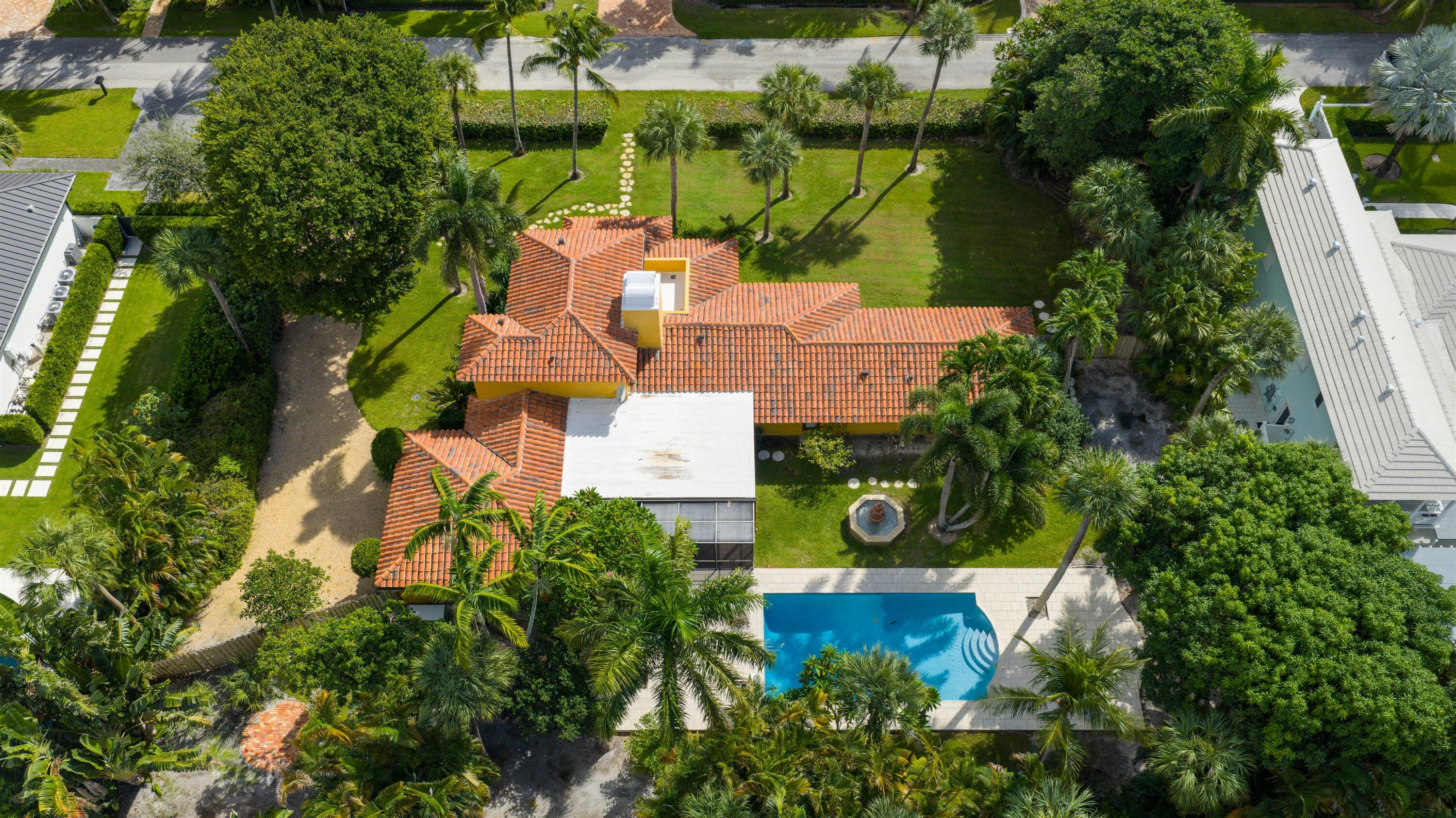 Beautifully maintained and thoughtfully updated 1950s residence, steeped in historical significance, was designed by renowned architect Beford Shoumate. This exquisite three-bedroom residence features an array of striking characteristics maintaining the charm of its era that include wood-beamed ceilings and rich cypress paneling complemented by Dade County pine and Mexican-tile flooring 334 Palm Trail, Delray Beach, Florida: The desirable Palm Trail neighborhood is perfectly located, just minutes from Delray Beach's award-winning sand-carpeted beaches, as well as vibrant Atlantic Avenue's boutique shopping, dining and nightlife venues. It is barely 20± minutes from Boca Raton's private executive airport, and an easy 30± minute commute to Palm Beach International Airport.

PROPERTY: 
 
Sited on more than a half-acre parcel, with expansive lawns, old-growth trees, tropical landscaping and sea grape hedging in Delray Beach's Palm Trail area, steppingstones lead to the front entryway, establishing a gracious sense of place. In the back, the screened loggia, with Mexican-tile flooring and a wood-beamed ceiling, flow out to the sun-splashed pool set within a large patio.

RESIDENCE:  

This beautifully maintained and thoughtfully updated 1950s residence, steeped in historical significance, was designed  by renowned architect Beford Shoumate for Lowell Davidson Kern, Delray Beach's mayor in 1956, and his wife, Dorothy. Spanning 3,738± total square feet, this exquisite three-bedroom residence features an array of striking characteristics that evoke the charm of its era. Creating a harmonious flow, the open-concept living and dining rooms showcase two fireplaces, pine flooring and wood beamed ceilings, along with cypress-paneled and brick accent walls. Embracing the allure of indoor/outdoor living, sliding glass doors from the dining room open to the large, screened pool loggia. Enriched by painted paneling, wood cabinets and a floor that incorporates decorative, hand-painted Mexican tile, the kitchen is finished with granite counters, high-end stainless-steel appliances, passe plats for easy entertaining, and a breakfast bar that opens to the family room. Offering garden views, a sitting room connects to the guest wing with two guest bedroom suites, with one currently serving as a pool-view office and the other featuring a peaked wood-beamed ceiling and offering garden views. Designed with a split-bedroom plan, the primary suite presides over the second floor. A serene retreat with a cypress-wood beamed volume ceiling, a fireplace with a simple brick surround, picture windows offering garden views and a private balcony, the suite comprises a custom-fitted walk-in closet and a bathroom with quartz finishes, two wood vanities and a glass-enclosed shower. Completing the layout are a powder room, a laundry room with a pantry closet and the  two-car garage. With an easy flowing layout, new Hurricane rated windows and doors, inviting outdoor spaces, new and rich architectural details in the heart of Delray Beach, this residence is not just a place to live, but a canvas for creating cherished memories.


The information herein is deemed reliable and subject to errors, omissions or changes without notice.  The information has been derived from architectural plans or county records. Buyer should verify all measurements. 

DISCLAIMER: Information published or otherwise provided by the listing company and its representatives including but not limited to prices, measurements, square footages, lot sizes, calculations, statistics, and videos are deemed reliable but are not guaranteed and are subject to errors, omissions or changes without notice. All such information should be independently verified by any prospective purchaser or seller. Parties should perform their own due diligence to verify such information prior to a sale or listing. Listing company expressly disclaims any warranty or representation regarding such information. Prices published are either list price, sold price, and/or last asking price. The listing company participates in the Multiple Listing Service and IDX. The properties published as listed and sold are not necessarily exclusive to listing company and may be listed or have sold with other members of the Multiple Listing Service. Transactions where listing company represented both buyers and sellers are calculated as two sales. "No payments made until title passes" Some affiliations may not be applicable to certain geographic areas. If your property is currently listed with another broker, please disregard any solicitation for services. Information published or otherwise provided by seller, listing company or its representatives is deemed reliable but are not guaranteed and subject to errors, omissions, or changes without notice. Copyright 2024 by the listing company. All Rights Reserved.