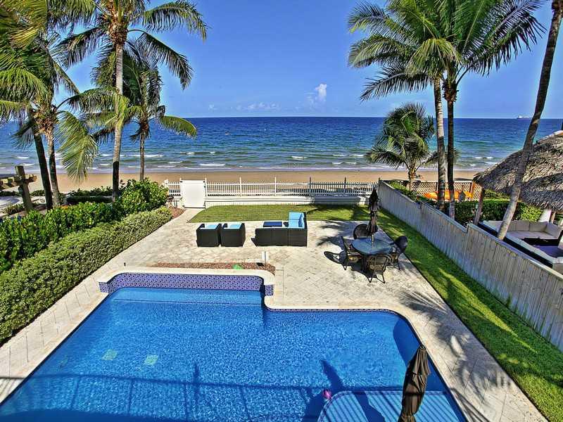 Direct Oceanfront Estate - On the Beach...On the Sand. Enhance your lifestyle and wake up to wonderful Atlantic sunrises and sparking waves. Take pleasure in the expansive & unobstructed ocean views from this sophisticated, oceanfront home which features:  timeless architecture, open floor plan, new high impact glass, travertine floors, expansive terrace, camera surveillance/ alarm, cabana bath and autofill heated pool. Enjoy the privacy, comfort and a perfect combination of FL beach, ocean and location.