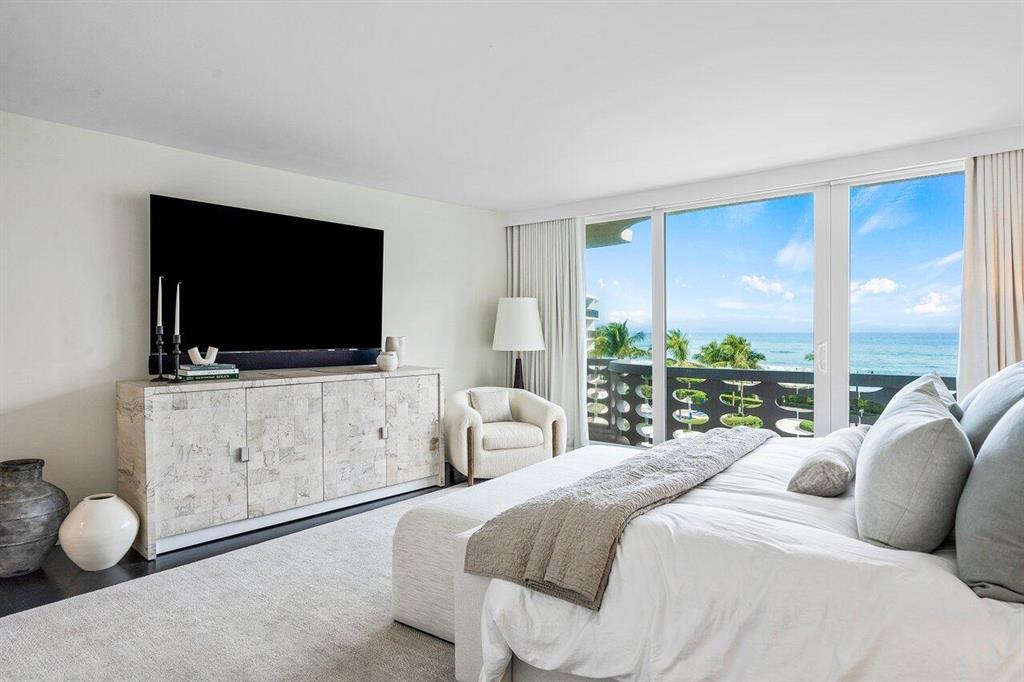 Ideally situated with expansive ocean views is this tastefully renovated 2/2.5 on the 5th floor!  An inviting split floor plan, it has a neutral palette, hardwood floors, new kitchen in one of Palm Beach's in town coveted ocean front condos with full amenities including: valet parking, concierge, salt water pool, fully equipped gym and close to restaurants, shopping and more!