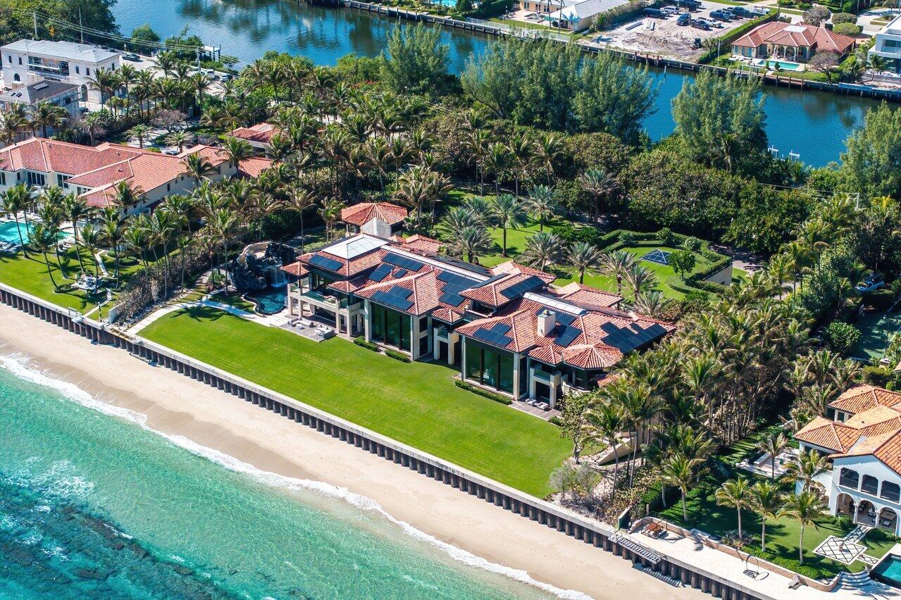 Ready for immediate occupancy. Magnificent Manalapan Modern Balinese inspired 2.83 acre estate, 34,498-square-foot full resort-style compound with unparalleled direct ocean views. Boasting 300+ feet of water frontage from ocean to Intracoastal making it one of the largest estates in Manalapan. Completely reimagined with recent upgrades and improvements including movie room, library, game rooms, wine room, ocean office, and several private lounges and flex spaces ensuring all needs are met.  Designed by the famed Marc-Michaels Interior Design Inc, this house comes fully custom furnished & turnkey!  This estate includes a total of 9 Bedrooms, 11.5 Baths, with 7 oceanfront suites and 2 lush guest garden suites. Both formal living room & family room have dramatic one of a kind 30ft floor to ceiling windows. A dedicated spa and wellness wing offers a gym, massage room, rain shower, and oceanfront yoga terrace. Outdoor highlights include expansive loggias, oceanfront balconies, a resort-style saltwater pool with waterfalls and waterslide, oversized spa, full outdoor kitchen, and lush tropical landscaping. A private deep-water dock provides direct ocean access via multiple inlets, completing this rare oceanfront and boating estate in prestigious Manalapan.   This property is being offered fully furnished as is now, with an exclusion list to be provided for some small personal items.  DISCLAIMER: Information published or otherwise provided by the listing company & its representatives is deemed reliable but not guaranteed are is subject to errors, omissions, or changes without notice. All information should be independently verified by any prospective buyer or seller. Listing company expressly disclaims any warranty or representation regarding such information.