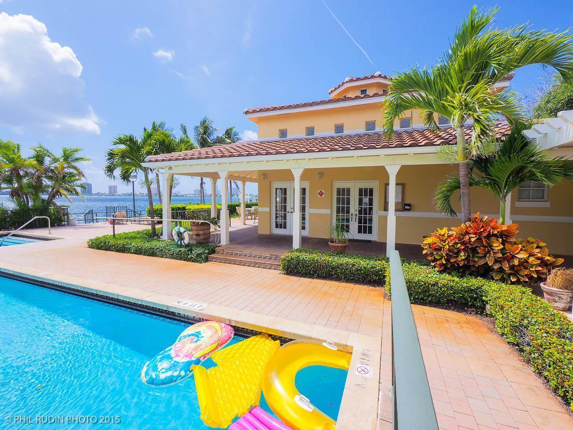 Clean corner 1st floor 2 bedroom 2 bath condo with private 1 car garage  in gated , intracoastal community . No carpet in unit, water included in rent . Boat dock also available for $2600