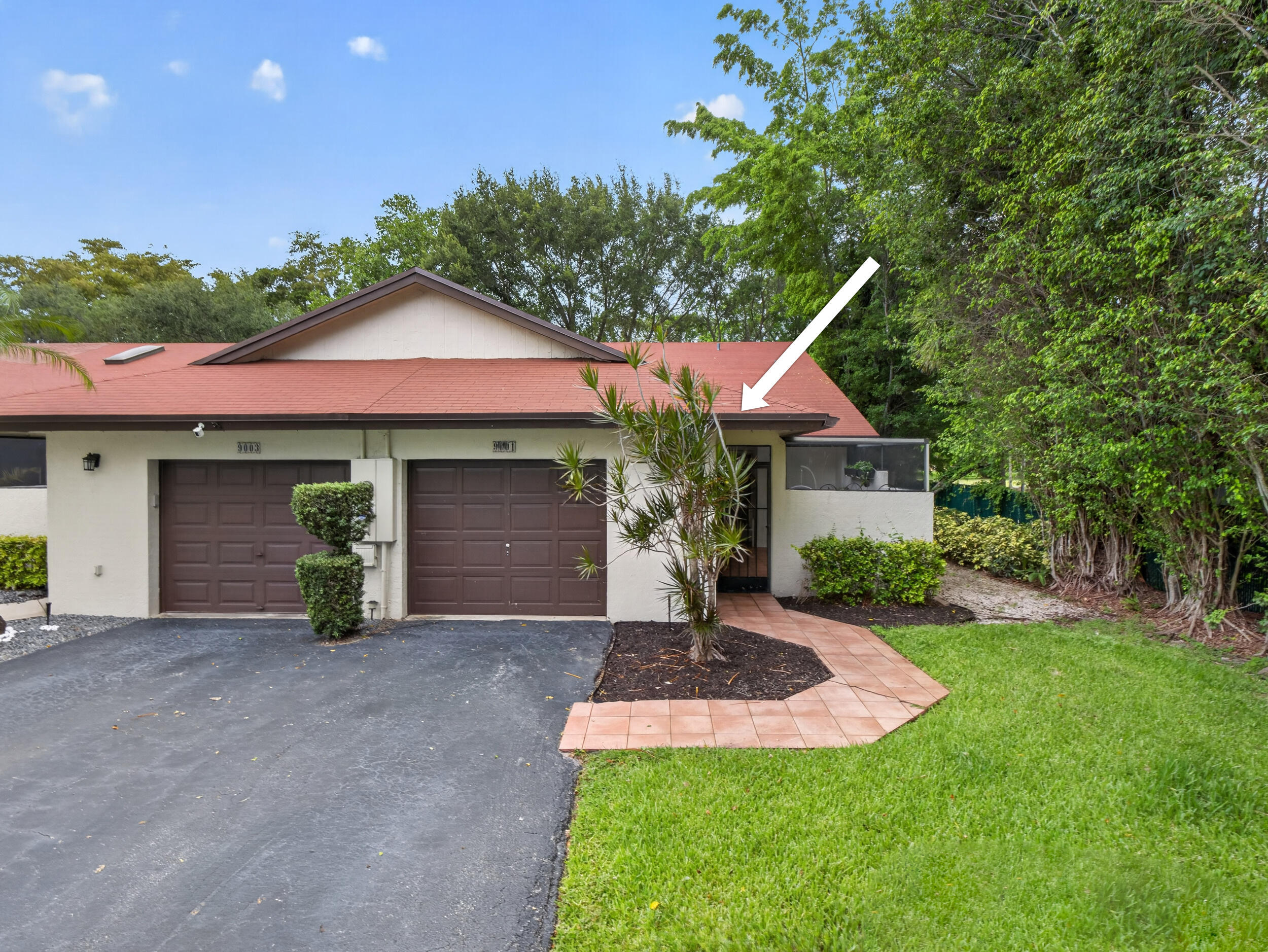 Charming family villa featuring 2 bedrooms plus a study that can easily serve as a 3rd bedroom. Enter through a cozy screened-in courtyard patio and enjoy beautiful golf course views from the bright sunroom surrounded by windows. The modern kitchen was updated within the past 2 years and features an island with seating, stainless steel appliances, and an open flow into the spacious living and dining areas. High vaulted ceilings create a bright and airy feel throughout. Additional upgrades include a 2-year-old roof, newer appliances, washer /dryer and second bathroom. Desirable corner-unit location offering extra privacy and natural light. Perfect for comfortable family living and entertaining