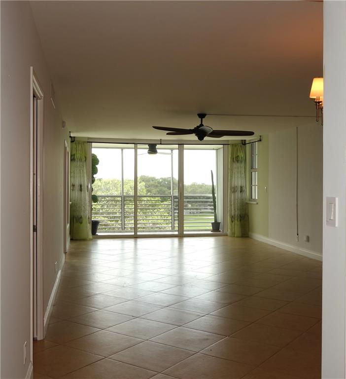 This fully remodeled top floor three bedroom two and one half bath home has been decked out with impact windows and shutters, remodeled kitchen, bathrooms, flooring and more. Palm Aire is one of the hottest markets in South Florida. Prices are stable and keep going up. The Isle Casino development will be one of the top features of South Florida which in turn will bring more buyers and even more demand. Don't miss out. The stain glass does not convey. This property is an estate and being sold as is. AC installed 2021, HWH is 2009.