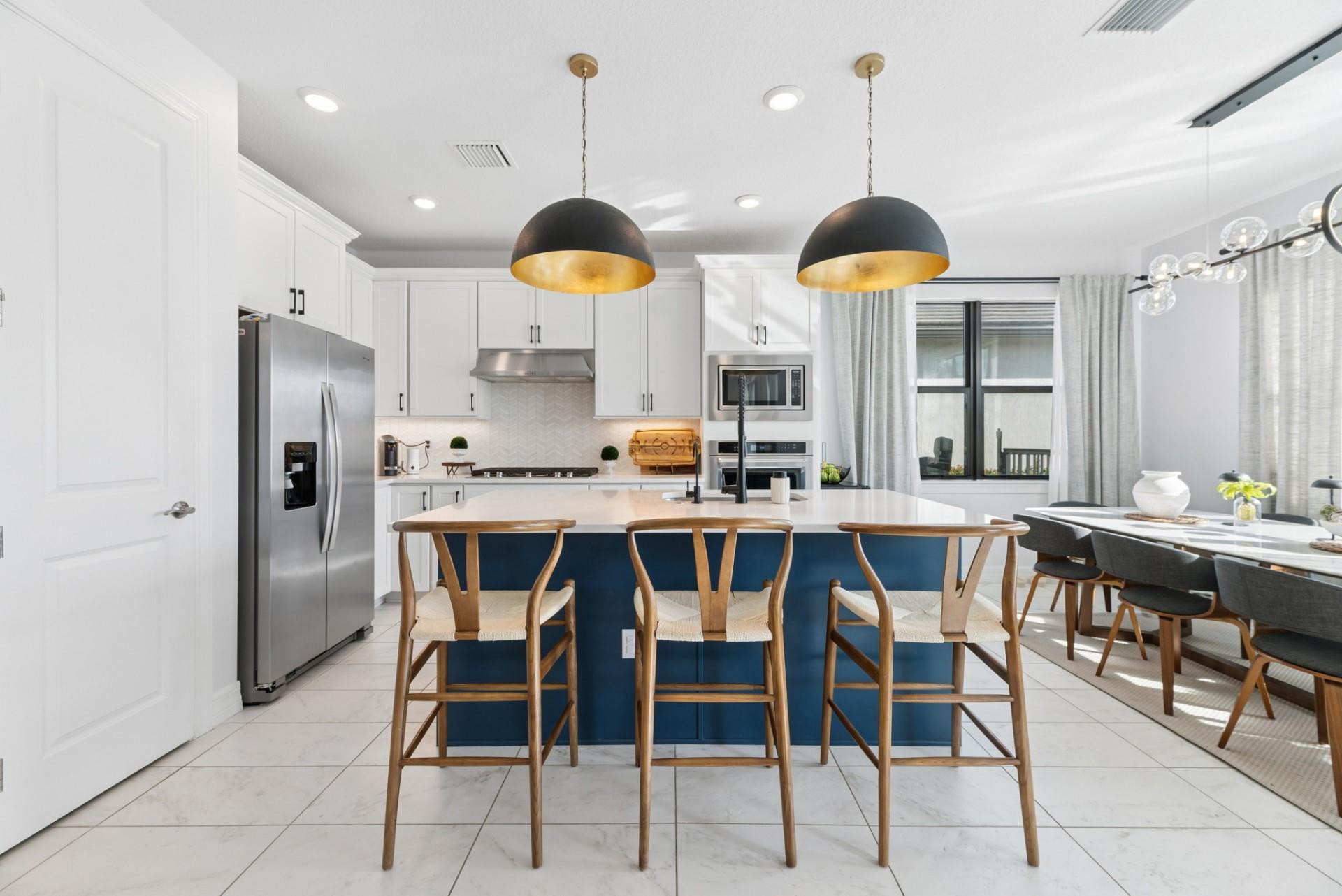 This stunning single-family home located at 4482 Silverwood Lane South in Oakland Park, FL was built in 2022 and offers modern luxury living at its finest. Featuring 3 bedrooms, a den, a 2nd living room upstairs, 2 full bathrooms, and 1 half bathroom. Situated on a generous lot, the property showcases a brand-new custom 416 square foot pool, perfectly designed for both relaxation and entertaining. The outdoor area is complemented by an elegant Ibiza White marble patio, creating a resort-style atmosphere ideal for South Florida living. Located in the desirable Oak Tree community, which offers modern amenities including a pool, pickleball courts, a tranquil oasis, gym, and office facilities, this property delivers the perfect balance of luxury, security and convenience.