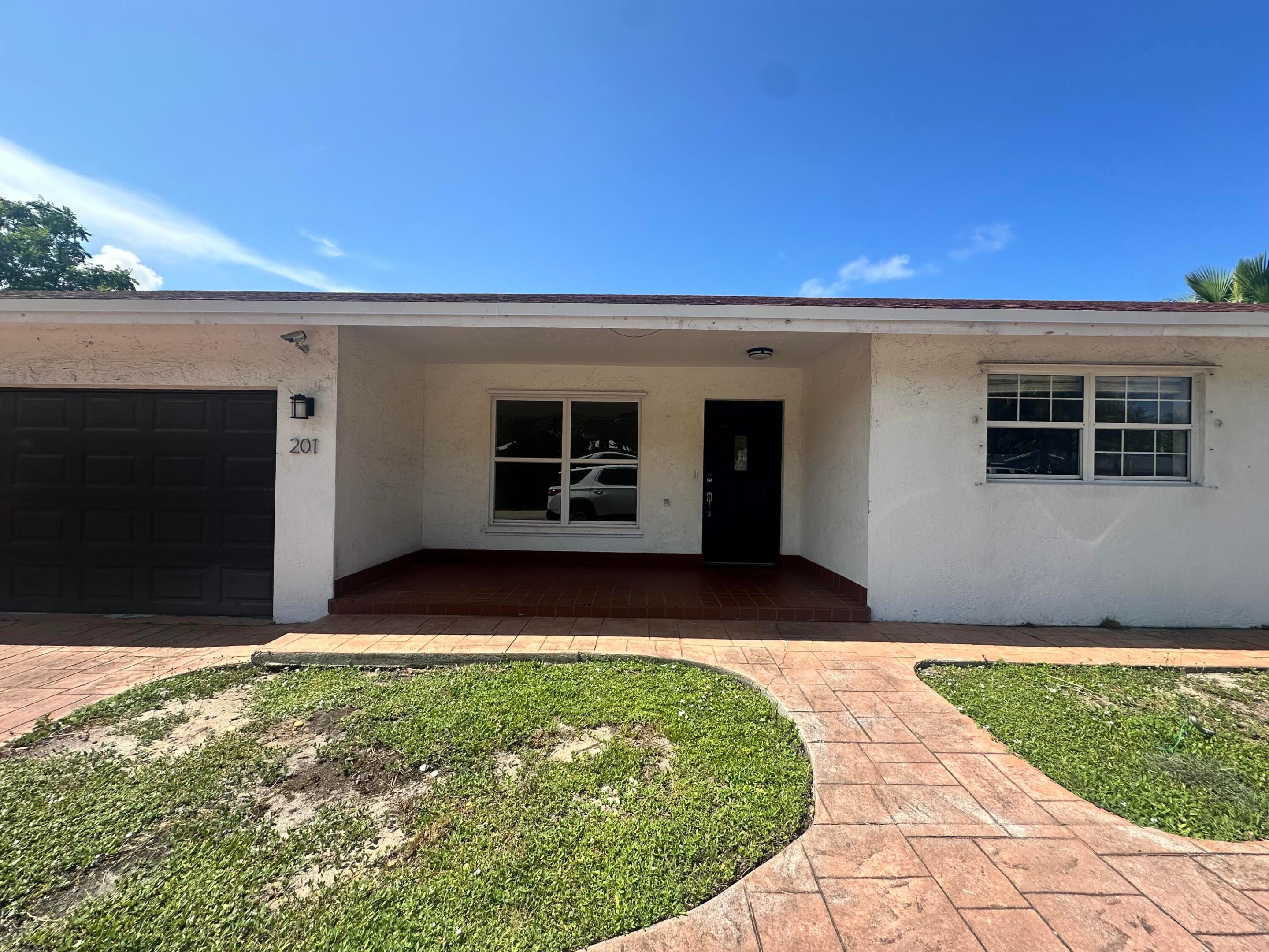 Ready for its next chapter, this East Boca Raton home offers an exceptional opportunity to make it your own. Situated on a nearly 1/3-acre corner lot with no HOA, the property offers endless possibilities for future enjoyment and expansion. Recent improvements include a NEW ROOF (June 2026), approximately one-year-old A/C system, tankless water heater and fresh interior paint throughout. The spacious lot provides ample room for outdoor living, entertaining, and future possibilities. The two-car garage, pool, and generous backyard further enhance the property's appeal. Conveniently located near beaches, shopping, dining, and everything East Boca has to offer, this is a rare opportunity to purchase a home with possibilities on one of the largest lots in the area.