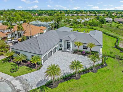 NEW CONSTRUCTION! In award winning Ibis Golf & CC completed in April 2023. Custom single story cul-d-sac home on 3/4 acre surrounded by serenity and nature. 14 ft. ceilings greet you upon entry with a spectacular view of the 60x20 pool and spa. Sylvester palms and triple fire bowls. A spacious owners suite with wet bar, massive his/her walk in closets featuring interior doors and built ins, and unique dual shower. 5 bedrooms including 2 VIP guest suites, all featuring en-suite baths and personal thermostats in each room. Viking and Decor kitchen appliances, dual dishwashers and ovens and ice maker in family room bar. Built-ins in the office/library and family room
