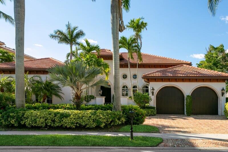 Custom Waterfront Estate offers 4 BR/5.5 BA plus a mahogany waterfront office.  This home offers, impact glass, marble floors, is freshly painted new carpets ,formal LR / DR and expansive views of a private large canal & NPB golf course. Gourmet kitchen with top-of-the-line appliances with a Viking stove, miele steamer, center cook island, subzero & custom cabinets. Coquina stone gas fireplace, formal DR With arched ceilings with custom crown molding. FR with built in's, wood beamed ceilings & sliders that lead outside to a pecky cypress covered patio, Summer kitchen, large, heated pool/ Jacuzzi and a private 90 ft. Dock with Electric & water for a boat up to 70 ft & a 30,000 lb. boat lift. Spacious MBR suite with double door Entry to a private bedroom, corbel detail tray ceiling.. with crown molding, walk In closets, French doors which enter the patio. Master bath with Jacuzzi tub, dual Vanities, marble shower, private water closet with bidet. The 4th BR is used as A media room with mahogany flooring and detailed ceiling with built in's, refrigerator and surround sound.  Central vacuum and a bonus outside storage closet complete this custom waterfront home in the gated community in North Palm Beach close to shopping, restaurants and is 10 minutes from the beach.