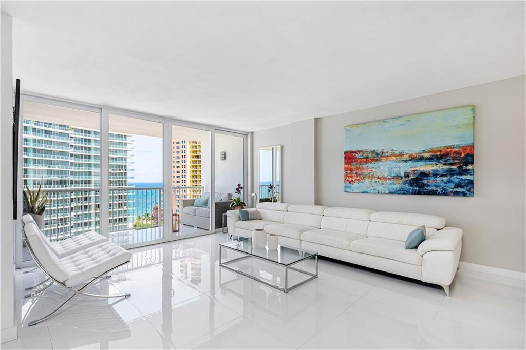 Presenting an impeccable contemporary renovation of this 15th floor, 1/1.5 condo in a pet-friendly buildingwith amazing beach and Intracoastal views. The open kitchen is designed for cooking and entertaining with plentiful custom cabinets. The Calcutta quartz countertops are striking, yet easy to maintain and are the perfect compliment to the honed marble backsplash. The 24 x 24-inch, white, ceramic tile floors flow through the living area and continues to the balcony for an incredible look.  There's polished marble tile, new vanities, and Hansgrohe fixtures, in the bathrooms. The oversized balcony is the perfect spot to entertain or just kick back and enjoy the waves roll in. Offering everything you expect in a full-service building: Doorman, clubhouse, gym, grills, pool, and security.