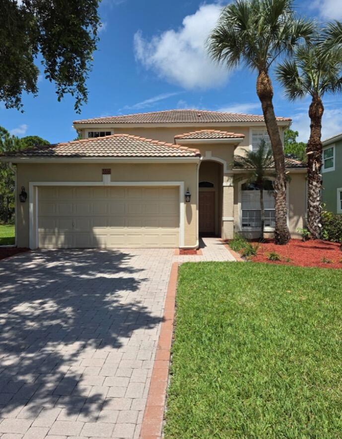 Welcome to this beautiful two-story home on an oversized corner lot offering exceptional privacy in the highly desirable Jensen Beach Country Club. Just 2 miles from the pristine beaches of Hutchinson Island, this home combines peaceful living with an unbeatable coastal lifestyle. Enjoy nearby boating, fishing, waterfront dining, charming downtown Jensen Beach, boutique shopping, and year-round festivals. Residents also have access to community pools, tennis courts, and the public Eagle Marsh Golf Club. Conveniently located near shopping, restaurants, and top-rated schools, this home is the perfect opportunity to experience the best of Florida living in one of Martin County's premier communities.