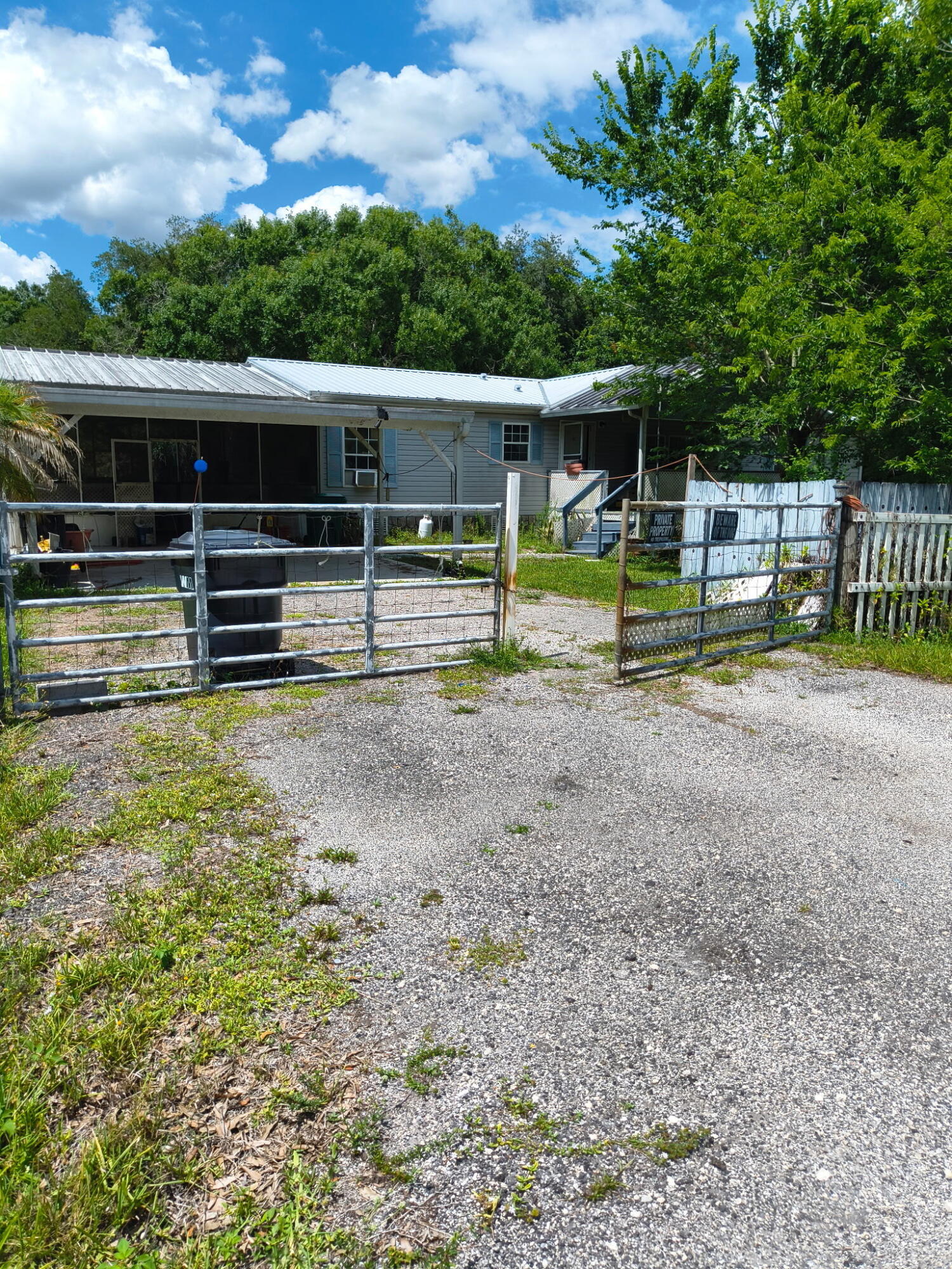 INVESTOR ALERT & BUYER DREAM! 0.46-ACRE DOUBLE LOT WITH NEW ROOF & FHA POTENTIAL! Priced sharp for an immediate contract at $159,900, the seller is sweetening the deal by offering a $3,000 CLOSING COST CREDIT to the buyer! Take advantage of this rare, sprawling property comprising two combined parcels in the quiet Four Seasons Estates subdivision.  Why rent when you can own for less? Thanks to this $3,000 credit, a buyer can secure a massive double lot and a move-in-ready home for less than $10,000 out of pocket, with a monthly payment that is significantly cheaper than renting a typical 3-bedroom apartment in South Florida.  This spacious 3-bedroom, 2-bathroom manufactured home offers 1,512 heated square feet (2,688 total under roof) and has a newer roof and a permanent structural  Property consists of two combined parcels (Lots 121D & 124D) currently taxed as one. Zoned RM (Residential Mixed) with Rural Activity Center future land use, offering excellent flexibility for additional structures or expansion. New roof installed [Insert Year]. Property is being sold in as-is condition. Buyers and their agents to verify all zoning, density, and building regulations directly with Okeechobee County planning department. It is the responsibility of buyer and agent to check this information