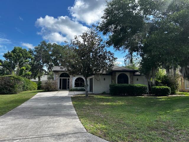 Welcome home to this well maintained 3BD 2BA single family residence offering a spacious layout with a large family room, eatin kitchen, formal dining area, and an enclosed patio perfect for year -round enjoyment. This property is truly move-in ready, providing comfort, functionality, and room to personalize. Located in the beautiful lakefront community of Waterwood, this home invites you to embrace a relaxed, outdoor friendly lifestyle...just bring your boat and fishing gear.