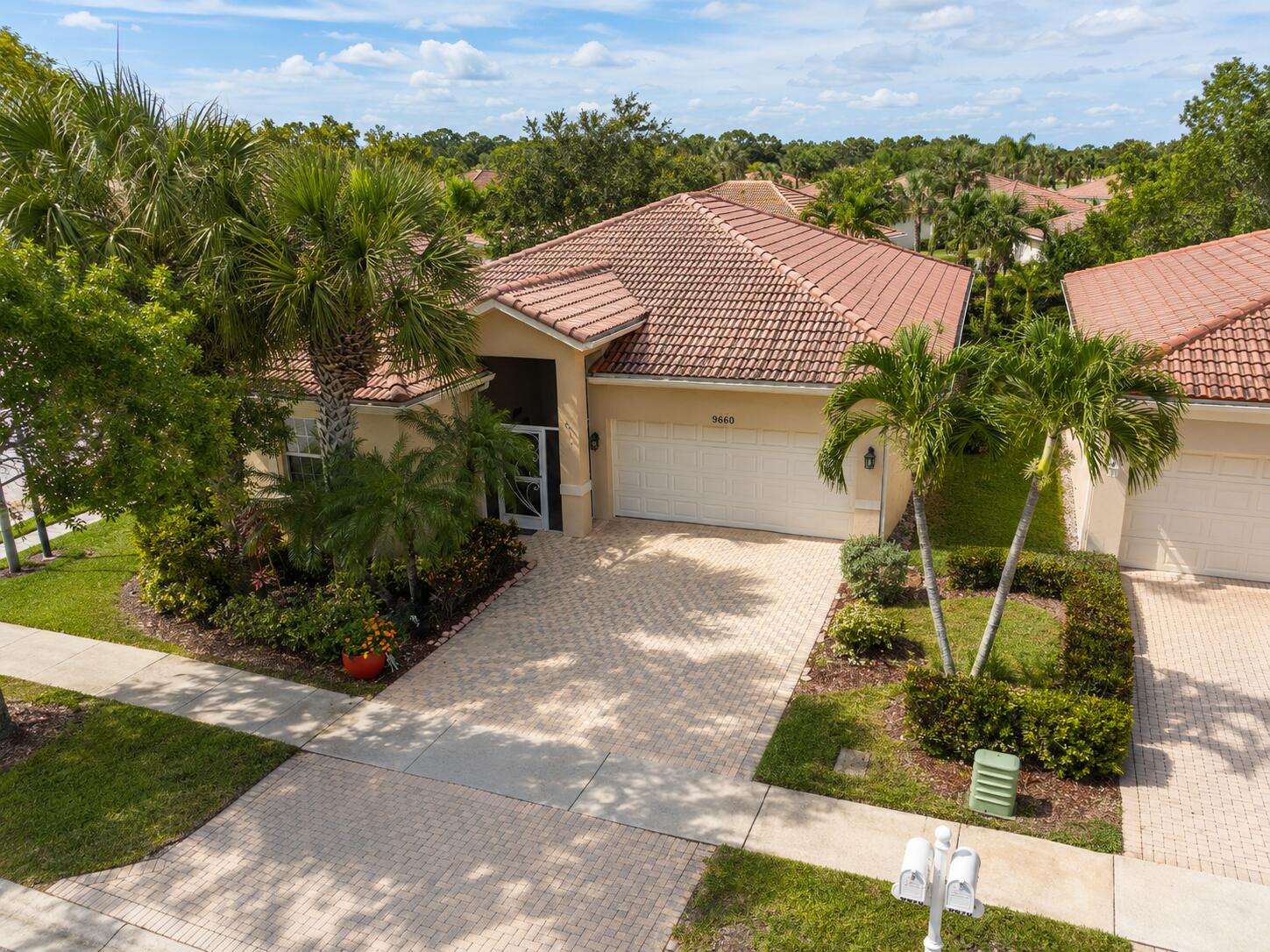 Experience the best of South Florida living in this beautifully maintained 3-bedroom, 2-bath residence located in the highly desirable gated community of Baywinds! Features Include: Soaring vaulted ceilings Spacious open floor plan Screened private pool Neutral tile flooring Two-car garage pet friendly  Move-in ready condition Where Every Day Feels Like a Vacation! Baywinds is one of Palm Beach County's premier active 55+ gated communities, offering a true resort-style lifestyle behind a 24-hour manned security gate. Residents enjoy beautifully maintained grounds and an active social calendar with amenities that include: Two sparkling swimming pools Pickleball courts Tennis, fitness center, and walking paths Clubs, activities, and social events year around