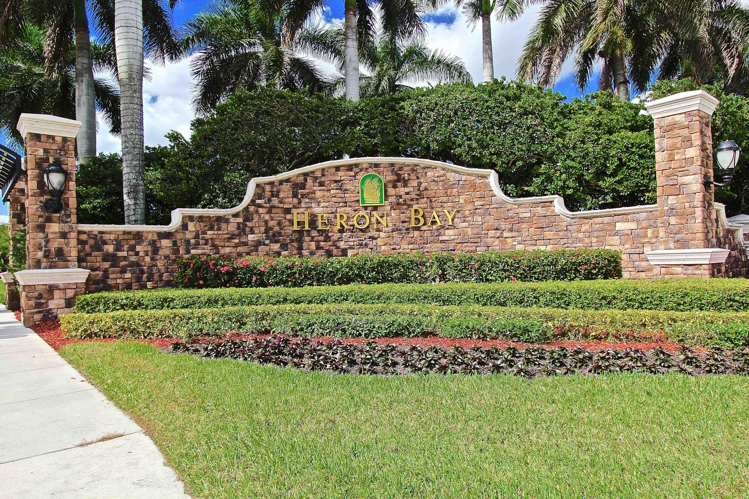 Your new home awaits in L'Hermitage at Heron Bay! This Mediterranean Beauty offers an ideal location—walk across the street to pickleball, tennis, fitness center, playground, basketball & full clubhouse amenities. New roof (12/2021) including all New Gutters. Light, bright design with soaring ceilings  &  windows windows everywhere. Recently refinished pool & spa with expansive, private & screened patio & fenced yard . Perfect for entertaining. Enormous primary suite with sitting area + three additional bedrooms provide flexibility for family, guests & office needs. Three car garage w/ ample storage in addition to a large driveway offering loads of parking.  Exceptional indoor/outdoor living in one of Coral Springs/Parkland's most sought after gated communities close to all local schools !