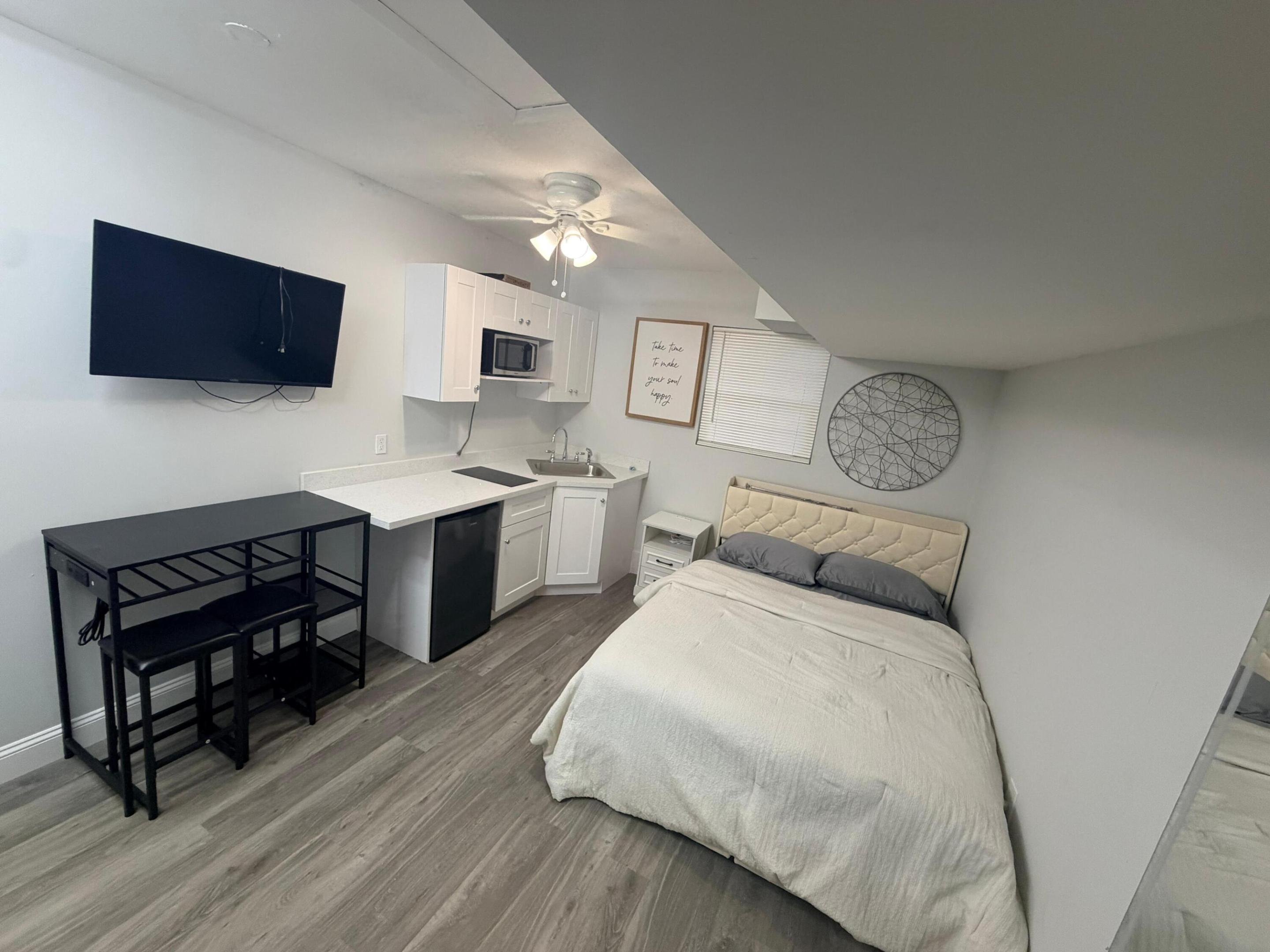 Back on the Market: Efficiency for single person with it's parking space, private/separate entry, trash, water,  internet, and electricity/light. Access to washer and dryer. Has a small stove, small refrigerator, microwave. Everything NEW and fully furnished.