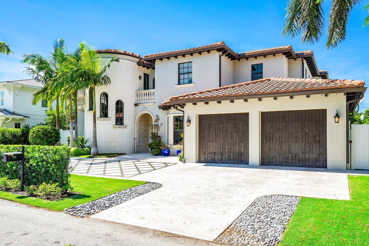 Palm Beach living at its finest! This spectacular estate home is on the exclusive Palmetto Ln Intracoastal block of the highly sought-after South End neighborhood AKA 'SOSO'. Enter this sun-drenched home to soaring ceilings overlooking a custom saltwater LAP POOL with spa. The two-car garage conveniently opens into a mudroom and beautiful custom chef's kitchen. Enjoy the best of indoor/outdoor living in the heart of West Palm Beach. A covered loggia overlooking the pool with an outdoor kitchen and putting green make this home perfect for entertaining and enjoying family and friends. First floor bedroom with ensuite bath, family room, dining room and gorgeous fireplace in the living room flanked by French doors to a spacious light and bright home office - this home has it all! Upstairs the master bedroom is replete with large walk-in closets, his and her baths, and opens up to a large shared balcony. Two more upstairs bedrooms share a Jack and Jill bathroom and the fifth bedroom enjoys its own private en-suite bath. Meticulously maintained by the owners, the property boasts numerous upgrades including a full house generator, hurricane impact glass doors and windows, natural gas, mosquito misting system, and a brand new irrigation system.
Minutes from your front door enjoy walks along the intracoastal on the Flagler Drive trail, beautiful beaches, Palm Beach, downtown West Palm Beach dining, shopping, A rated private and public schools, the Brightline train and Palm Beach International Airport.  This is where you want to be!
