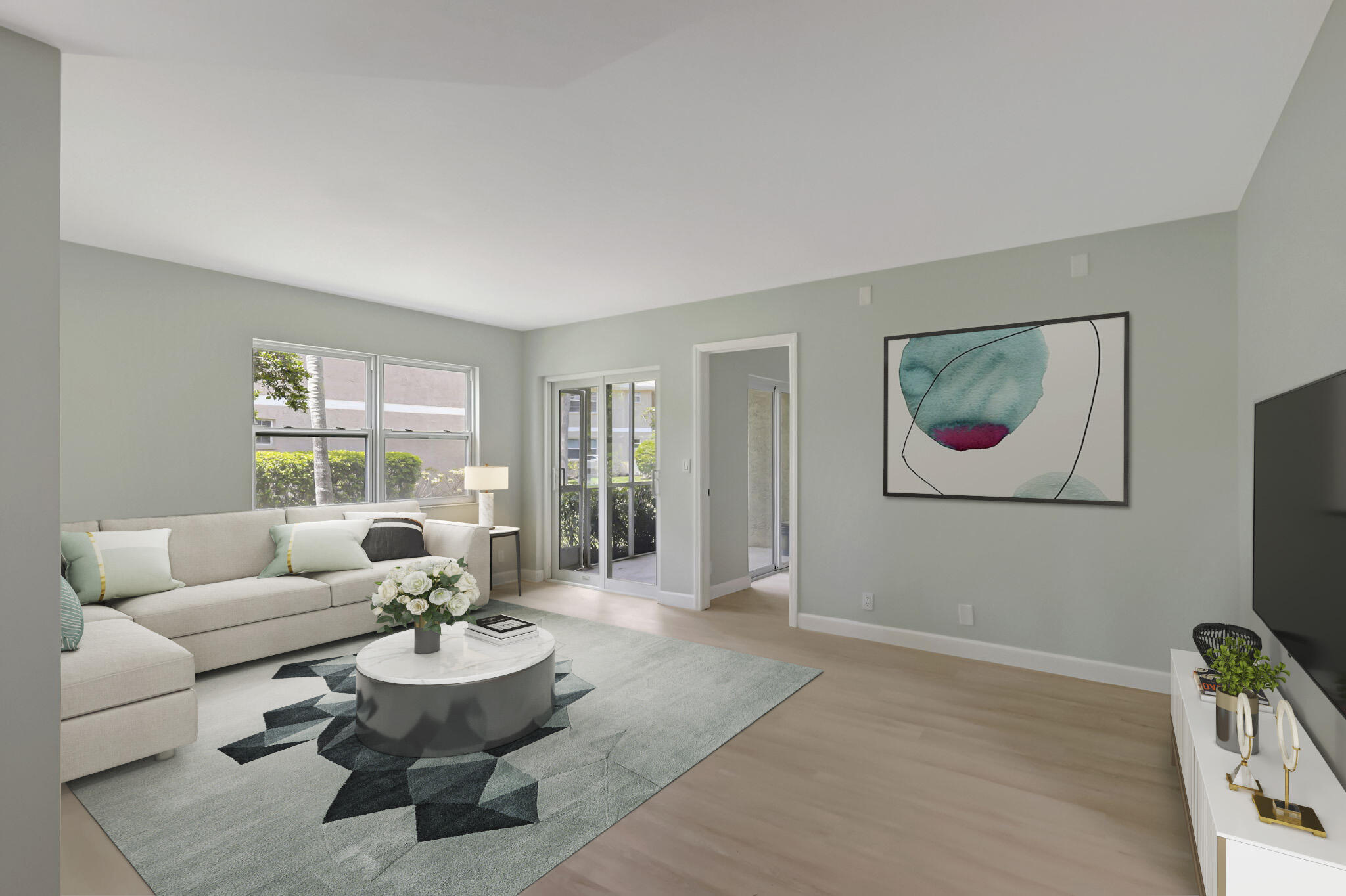 Renovated ground-floor condo with concrete block construction, impact glass, and a 2022 roof. The interior was taken down and rebuilt with all new drywall, luxury vinyl planking (waterproof flooring), doors, trim, lighting, and modern finishes throughout. Brand-new kitchen with soft-close cabinets, stainless appliances, Corian counters, tiled backsplash, and deep sink. Both bathrooms completely redone with new tile, vanities, and Delta fixtures. Screened porch with tropical landscaping. Community offers pool, clubhouse, exterior maintenance, low monthly fees, and is pet-friendly. Centrally located near shopping, dining, and medical.
