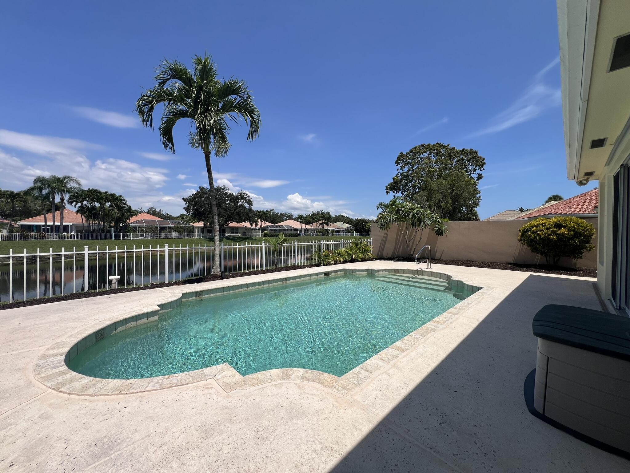 Beautiful DiVosta-built one-story single-family home featuring 3 bedrooms, 2 bathrooms, and a 2-car garage in one of Jupiter's most desirable neighborhoods. This light-filled residence offers an open and inviting floor plan with a neutral color palette, abundant natural light, and tranquil lake views. Enjoy your own private pool and a spacious backyard, perfect for relaxing or entertaining. The primary suite features two closets, while the ensuite bath offers dual vanities, a separate shower, soaking tub, and skylight that fills the space with natural light. HOA services include front lawn maintenance, trimming, irrigation repairs, and wet checks for added convenience. Ideally located near Jupiter's beautiful beaches, premier shopping, dining, I-95, and top-rated schools.  Available as an annual unfurnished rental only. One small pet will be considered with owner's approval. Tenant is responsible for all utilities.