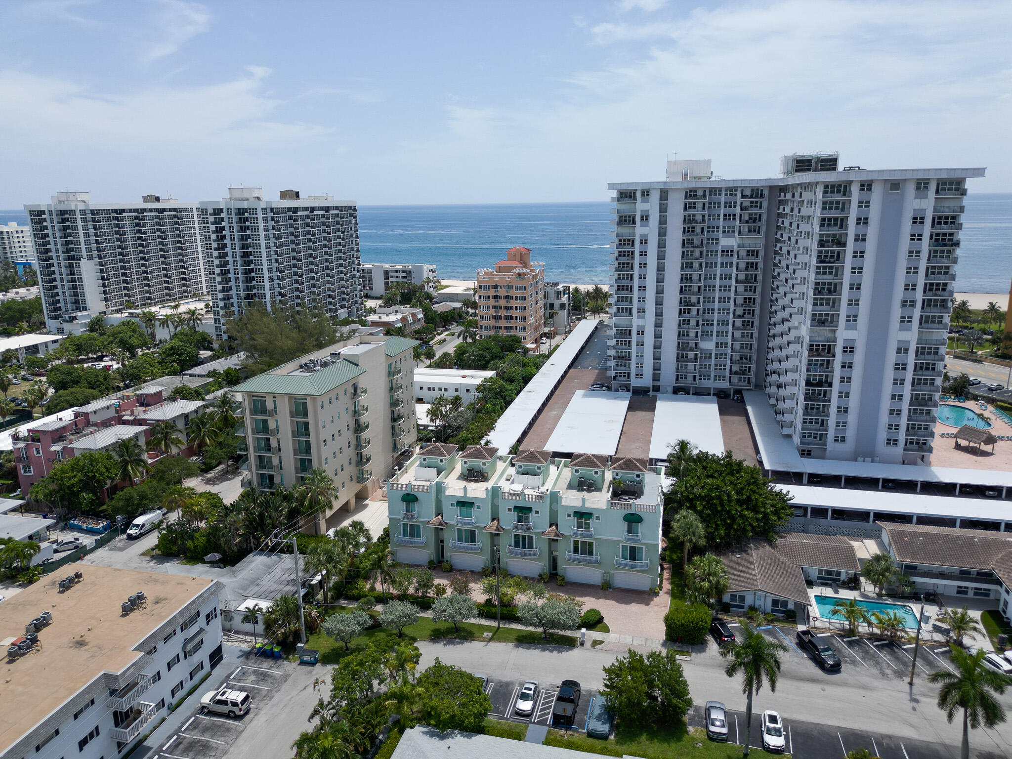 Perfectly positioned in the heart of Pompano Beach. This corner-unit, tri-level luxury townhm is just 1-minute walk to the beach & only a 5 min walk to the iconic Pier, waterfront restaurants & vibrant entertainment. Located in a 5 residence boutique comm, combining the privacy of a SF home w/ the convenience of townhm living. Private elevator services every level, including a 900+ sq. ft. rooftop terrace featuring ocean views on 1 side and Intracoastal views on the other—the perfect setting for entertaining, relaxing, or enjoying the sunrises & sunsets. This 3/3.5 residence features impact windows/doors, en-suite bathroom in every bdrm, & a spacious primary suite w/ dual walk-in closets. Yard, 2 car garage, water filter system, community pool & very low HOA. Owner financing is available.