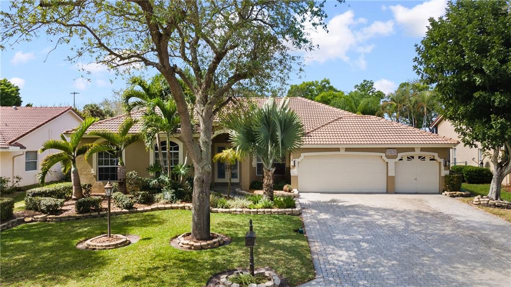 Come see this 4 bedroom. 2.5 bathroom pool home located in Westview Village. This home features a newer roof (2016), volume ceilings, spacious bedrooms, and an open kitchen to the living room. Enjoy your screened in private pool area, perfect for entertaining friends and family. Walk directly out your backyard and onto North Community Park where you will have access to baseball diamonds, soccer fields, tennis & basketball courts, walking paths, a playground and so much more. This home is located close to great shopping, restaurants, a movie theatre, and the Sawgrass Expressway. No approval process for buyers per property management company. Come see this 4 bedroom. 2.5 bathroom pool home located in Westview Village. This home features a newer roof (2016), volume ceilings, spacious bedrooms, and an open kitchen to the living room. Enjoy your screened in private pool area, perfect for entertaining friends and family. Walk directly out your backyard and onto North Community Park where you will have access to baseball diamonds, soccer fields, tennis & basketball courts, walking paths, a playground and so much more. This home is located close to great shopping, restaurants, a movie theatre, and the Sawgrass Expressway. No approval process for buyers per property management company.
