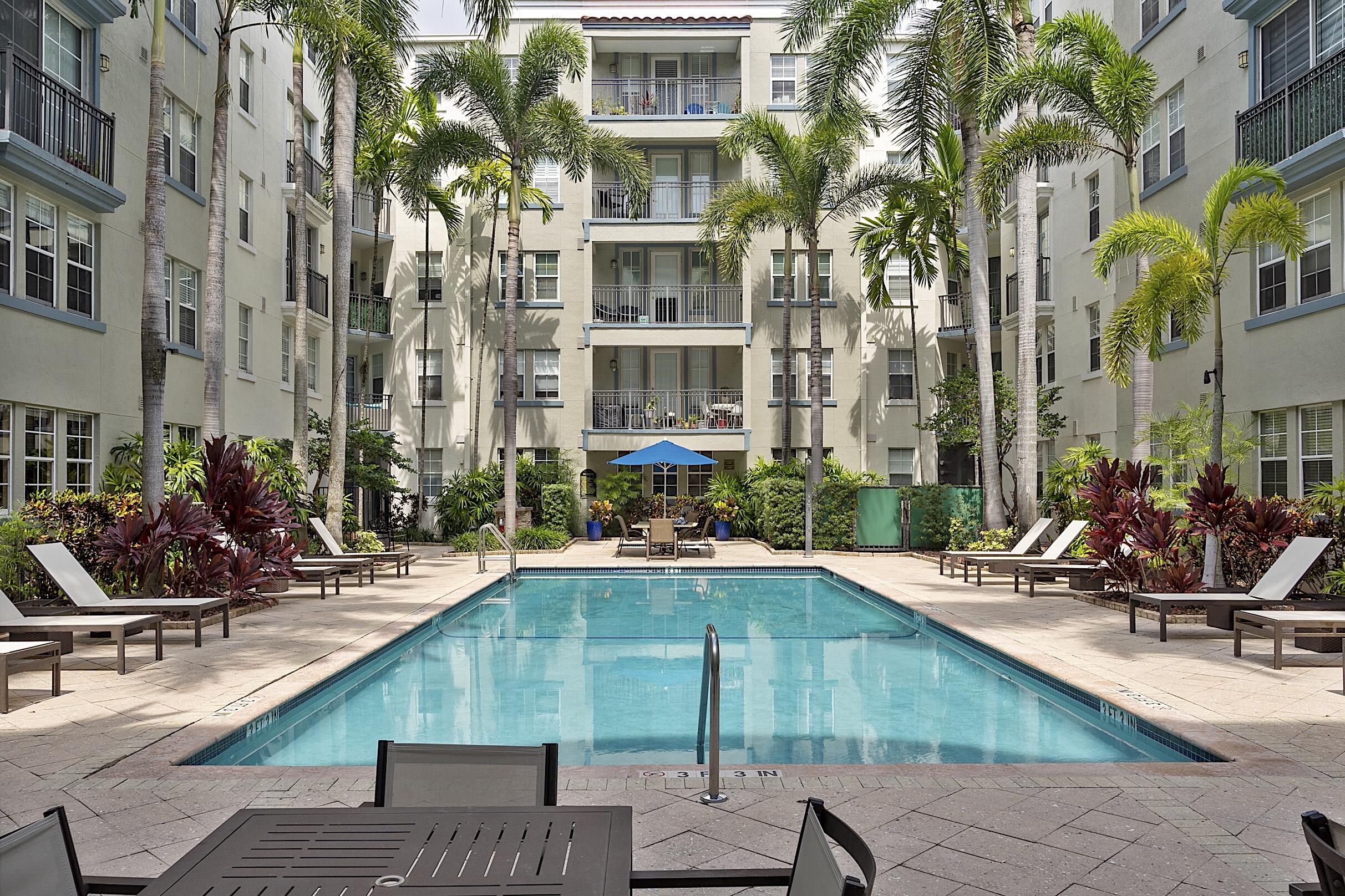 Welcome to SOLE AT FORT LAUDERDALE, luxury living in downtown Fort Lauderdale. This 2-bedroom, 2-bathroom condominium located  in vibrant Flagler Village, spans 1,270 square feet of bright, open plan living space with balcony, and tile throughout.  Updated open kitchen with s/s appliances, washer dryer in unit, spacious 2 bedroom split plan, with walk in closets, en suite main bedroom. Amenities include a beautiful tropical pool, hot tub/spa, rooftop sun deck, Zen garden, fitness center, club room, business center, bike storage, along with internet, cable, and water included in the rent.   The unit includes one garage space for convenient parking, with the option to rent a 2nd space for a fee. .  Walk to  Las Olas, shopping, restaurants, downtown, or a quick ride to the beach.