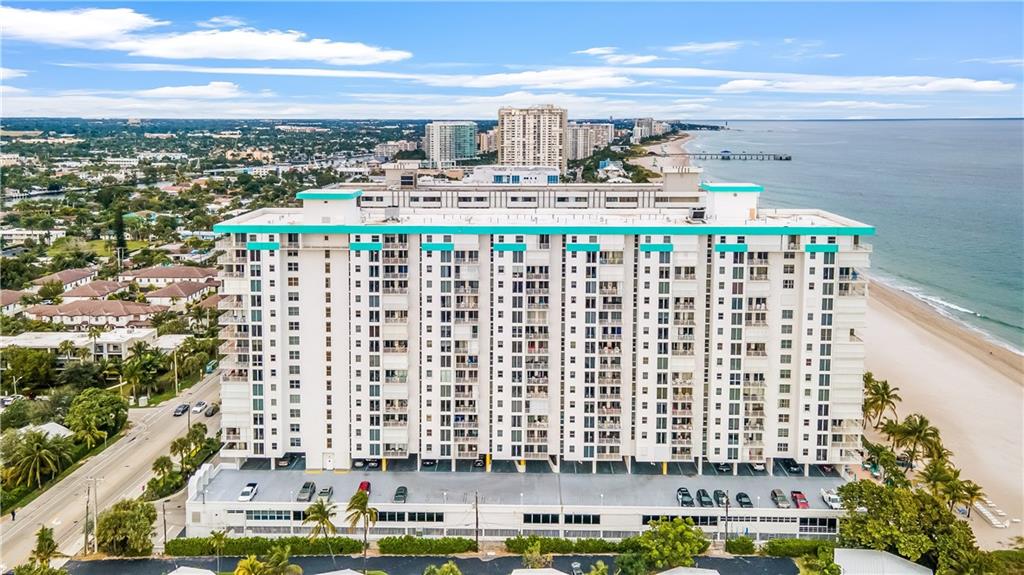 Best location in Pompano Beach! NW CORNER WITH SIDE OCEAN VIEW & SANTA BARBARA LAKE - INTERCOASTAL VIEW. Walking distance to Beach front restaurants and shops & the Pompano Beach Fishing Pier. The unit was completely renovated in 5 years ago including newer electric panel-AC unit-all new stainless steel kitchen appliances, electric blinds with remotes, custom made cabinets, quartzite kitchen counter, washer & dryer, impact windows & sliders, custom closets, tile throughout. Wraparound balcony. Just a short drive to Miami and Fort Lauderdale International Airports. 40-year inspection completed. Rents allowed after first year of ownership 2 times per year minimum 60 days. Friendly building with all the amenities. Maintenance fee includes water sewer garbage basic cable and internet. Hurry