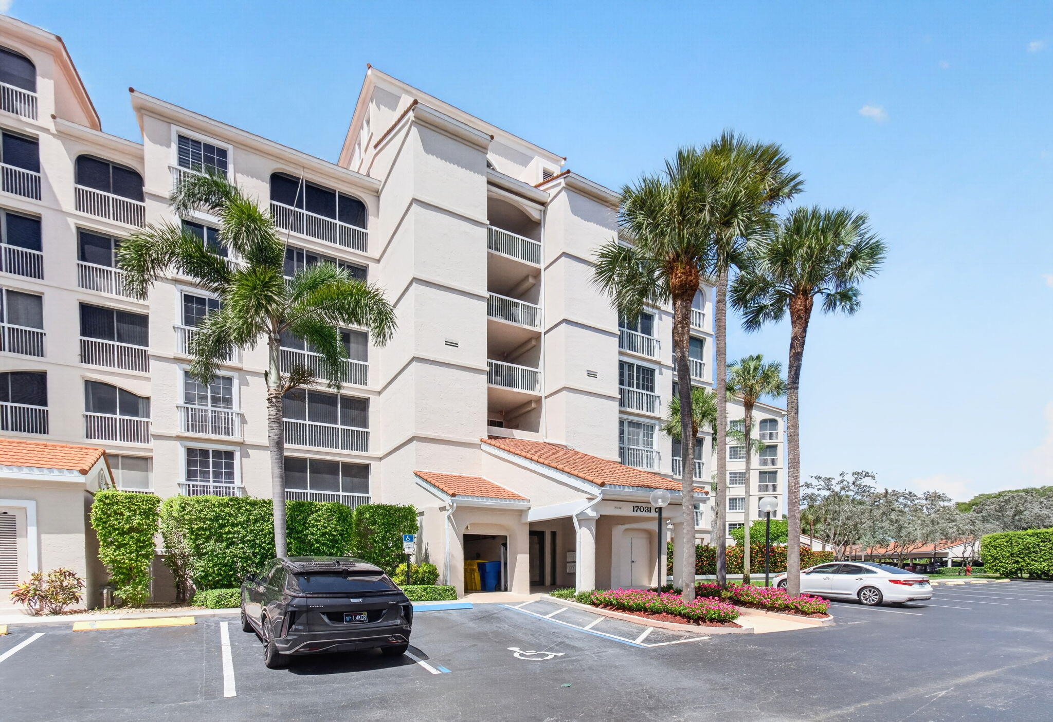 Welcome to Spyglass at Boca Country Club. Bright  & beautifully designed high-rise condo, offering 2 Bedrooms, 2.5 Baths, a Den that can easily be converted to a third bedroom, & a huge Florida Room. Well maintained unit overflowing with natural light & modern elegance throughout. Inside your unit you'll  find an inviting, open living space with panoramic golf views & sleek ceramic flooring. Spacious eat-in kitchen equipped with stainless steel appliances, granite countertops, & white cabinetry.  Large living room/dining area. Two generously sized bedrooms with a walk-in closet in the primary bedroom. Tons of extra storage. Primary Bath complete with double vanity, jacuzzi tub, & separate shower. Enjoy the added value of only two units to a floor, laundry room in unit, & private storage.  Enjoy the Spyglass amenities, including a sparking pool and lounge deck, hot tub and clubhouse. 24-hour manned gate, security patrol, and guest parking. Golf available all year round without the obligation of mandatory membership. Just minutes to the beach and Downtown dining, shopping, and cultural venues. Short drive to two International Airports. This residence combines privacy with luxurious, easy living. Don't miss the opportunity to make this gorgeous condo your next home.