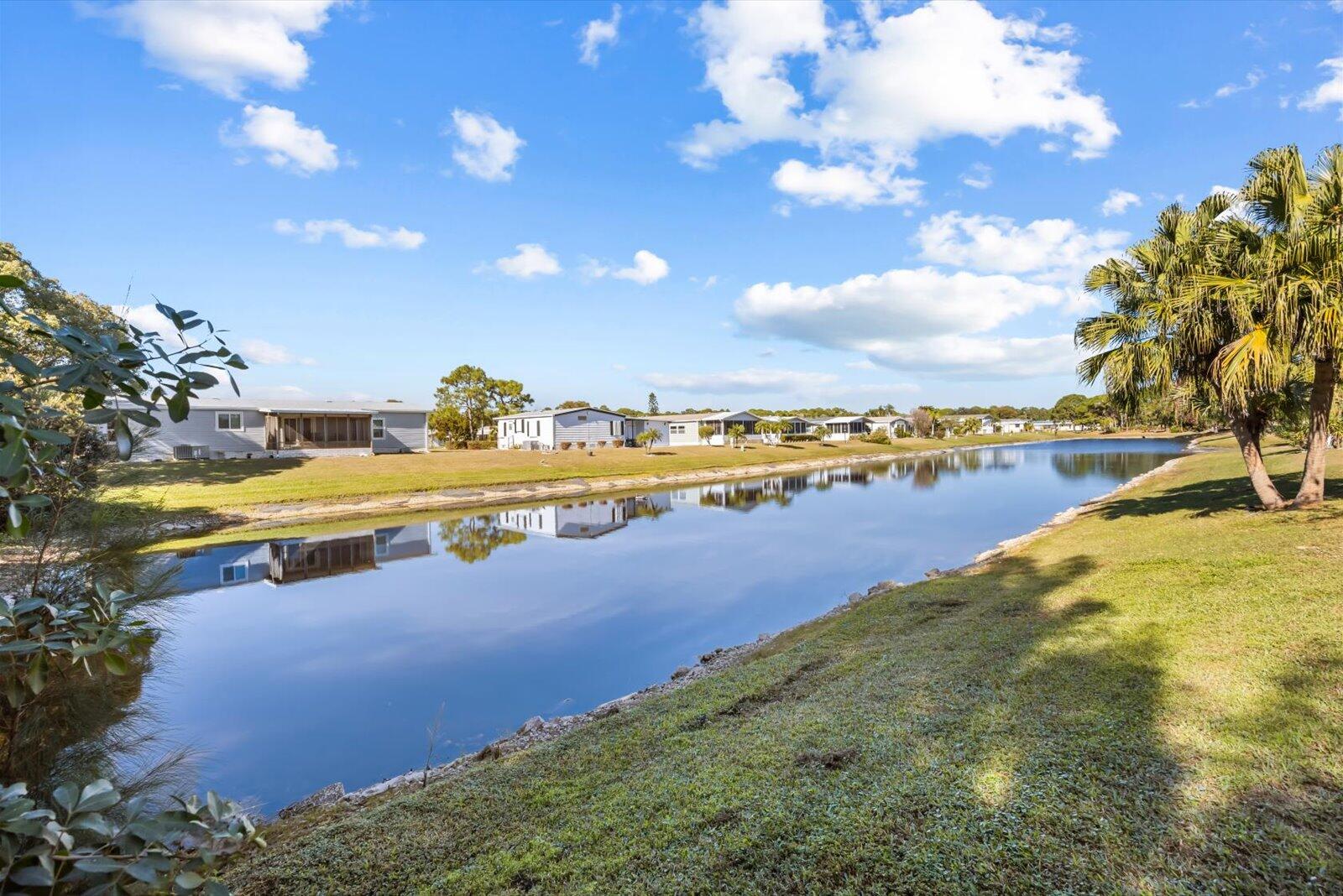 Lakefront 2 bedroom 2 bath home in the Savanna Club 55+ community. Home has newer laminated floors, 2016 roof, large enclosed lanai overlooking lake and perfectly tucked into a corner for privacy.
All measurements approximate, buyer to verify. Land lease property.