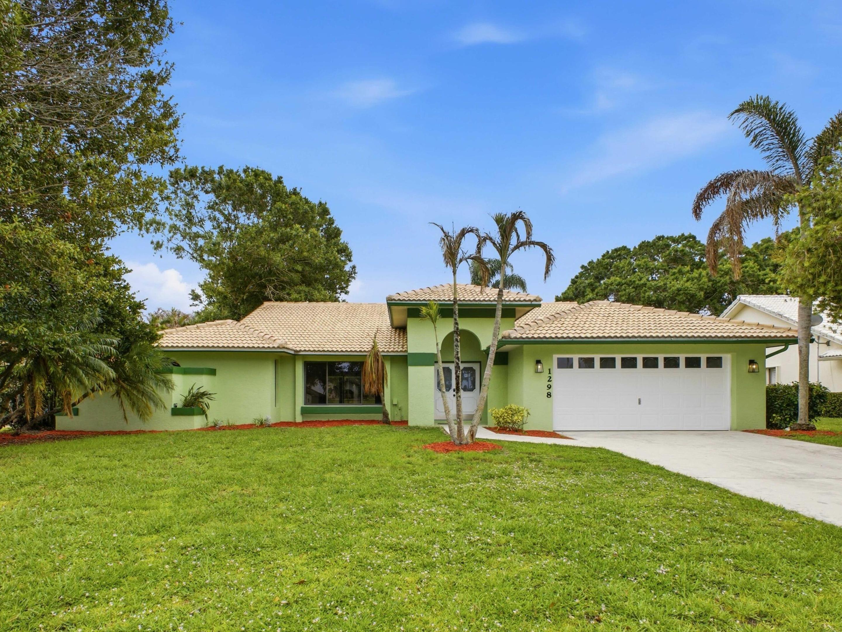 Welcome to Country Club Estates, a beautiful and well-maintained community nestled in the heart of St. Lucie West. Conveniently located near restaurants, shopping, and grocery stores, this charming 3-bedroom, 2-bathroom home offers over 2,100 square feet of comfortable living space. As you pull into the driveway and step inside, you'll immediately notice the spacious split floor plan and open layout, providing endless possibilities to make it your own. Roof 2017, A/C 2017, newer stainless steel appliances, oversized screen in patio with plenty of room to add a pool if desired. Whether you're looking for your first home, downsizing, or simply searching for a home in a fantastic location and in a gated community, this is the property for you.
