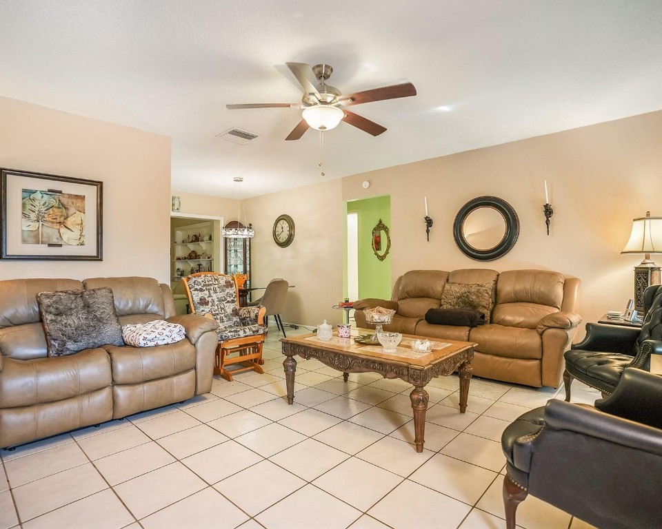 Beautiful 2 bed, 1 bath home in 55+ Mainlands of Tamarac. 1-car garage, bright white kitchen, and ceramic tile flooring throughout. Large bedrooms, pristine bathroom, and an organic flow that guides you from room to room. Partly furnished for easy move-in. AC updated in 2022 and roof in 2013. Enjoy comfortable living in a well-maintained community with ease and charm. Come see this special home today and make it yours.