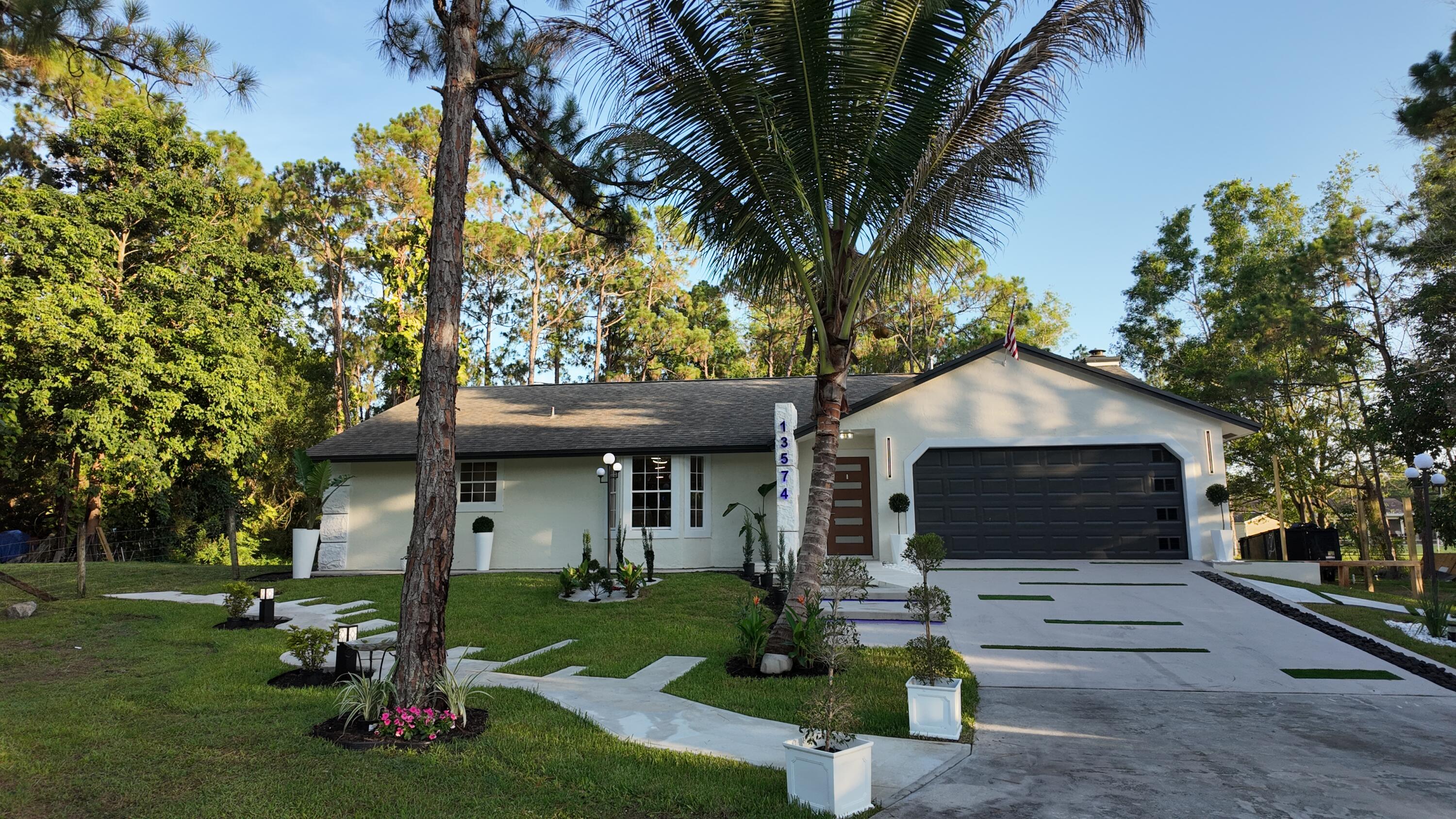 Completely renovated 3-bedroom, 2-bath home on 1.15 acres with NO HOA! Move right in without the hassle of renovations. Major upgrades include a 2021 roof, new 2026 A/C, new 2026 water heater, new 2026 electrical panel, new 2026 water filtration system, and complete hurricane shutters. The home also features two spacious living areas, a large primary suite with two walk-in closets, a 2-car garage, and a long driveway with plenty of parking. The sale includes two RVs: a 2026 26-foot travel trailer and a 2024 45-foot, 2-bedroom, 2-bath RV currently generating $1,700 per month in rental income. Conveniently located just minutes from shopping, dining, schools, and major roadways.