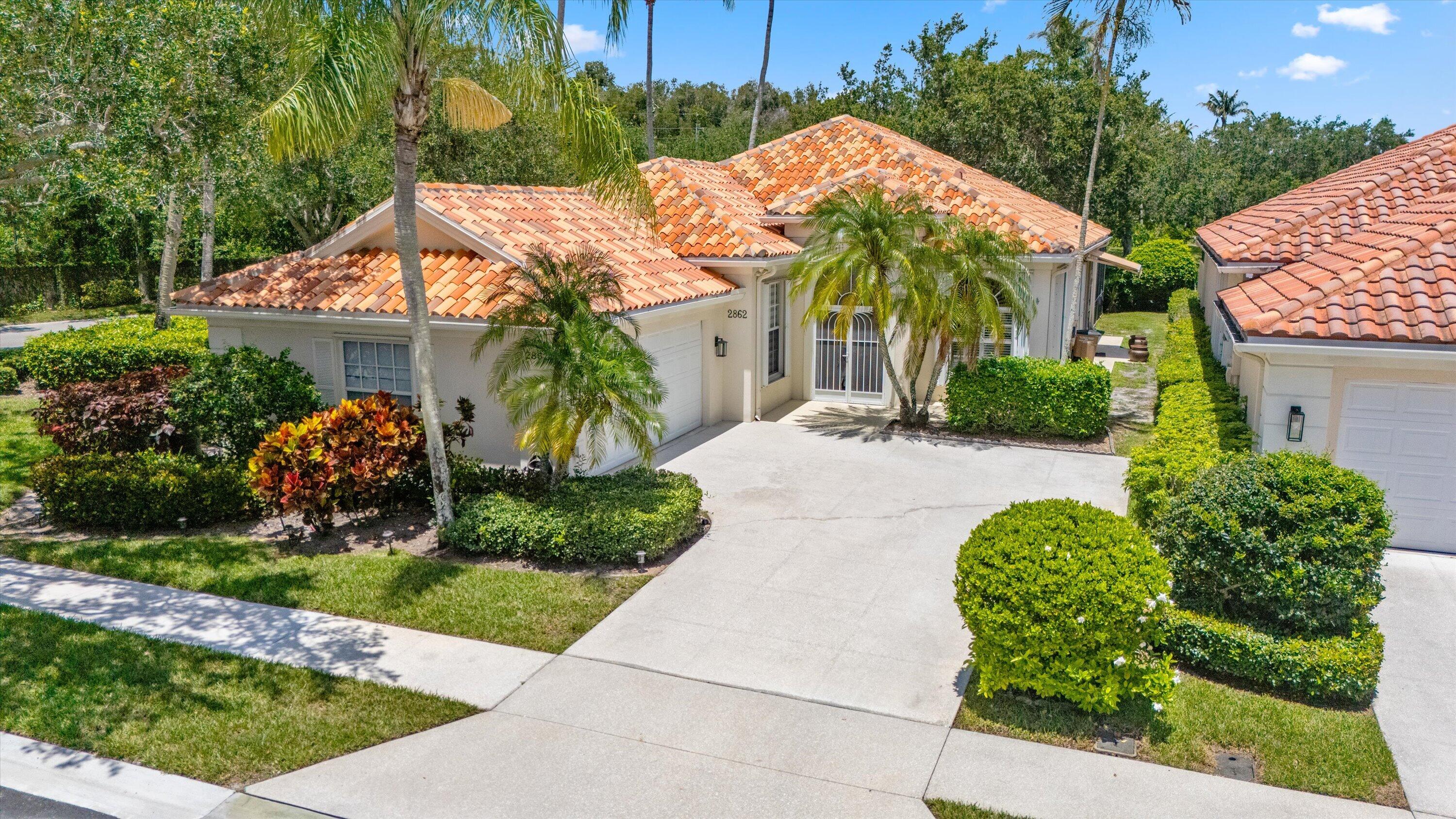 Welcome to this beautifully maintained 4-bedroom, 2-bath lakefront home situated on a desirable corner lot in the highly sought-after RiverWalk community of West Palm Beach. Designed for both comfortable everyday living and effortless entertaining, the home features an open floor plan that flows into an enclosed patio complete with a custom privacy wall and LED lighting, creating the perfect space to relax or host guests. Interior upgrades include ceramic tile throughout the main living areas, waterproof laminate flooring in all bedrooms, remote-operated blinds on the sliding glass doors, and plantation shutters or privacy blinds throughout the home. A generator transfer switch is already installed, allowing you to conveniently connect a portable generator and power the home during outages The 4th bedroom is currently configured as a den, offering excellent flexibility for a home office, media room, or guest space. The roof was fully replaced in 2015, providing added peace of mind. RiverWalk offers an exceptional resort-style lifestyle with a Town Center featuring activity rooms, a beauty salon, post office, café, three heated swimming pools, a fitness center, tennis courts, and over 12 miles of scenic walking paths and picturesque bridges. The HOA also includes beautifully maintained landscaping, allowing you to enjoy a low-maintenance lifestyle in one of West Palm Beach's premier gated communities.