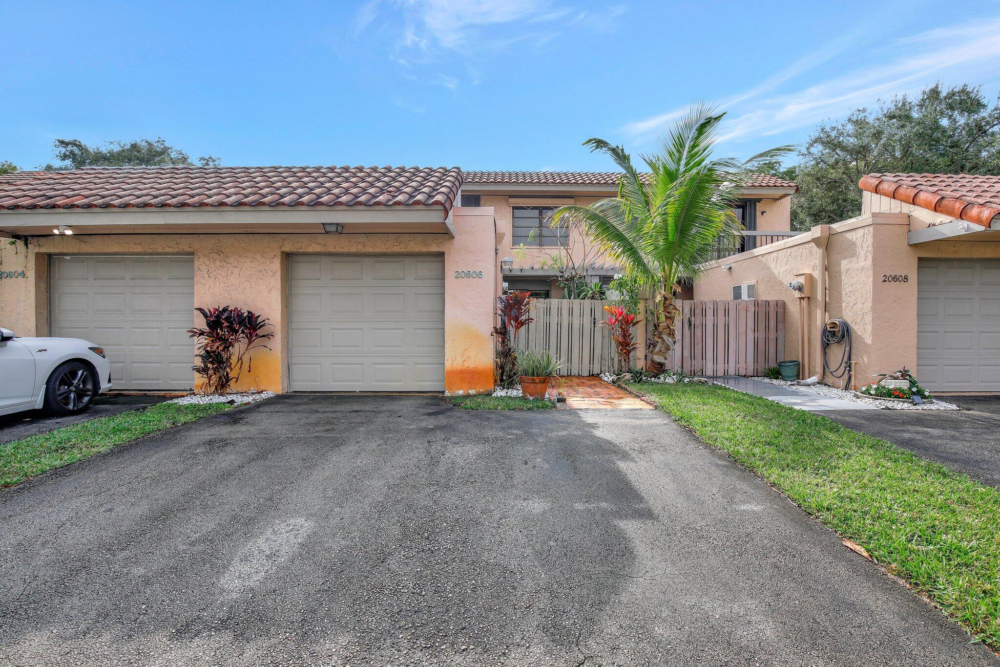 Welcome to this thoughtfully designed townhouse in the Townhouses of the California Club community in Miami. This two-story residence offers 2,120 square feet of finished living space, featuring three bedrooms and 2.5 bathrooms to accommodate various lifestyle needs. The practical one-car garage provides convenient parking and storage solutions. The multi-level layout maximizes the use of space, creating distinct areas for living, working, and relaxing throughout the home. Located in an established community, this townhouse presents an excellent opportunity for those seeking a well-proportioned residence in Miami.