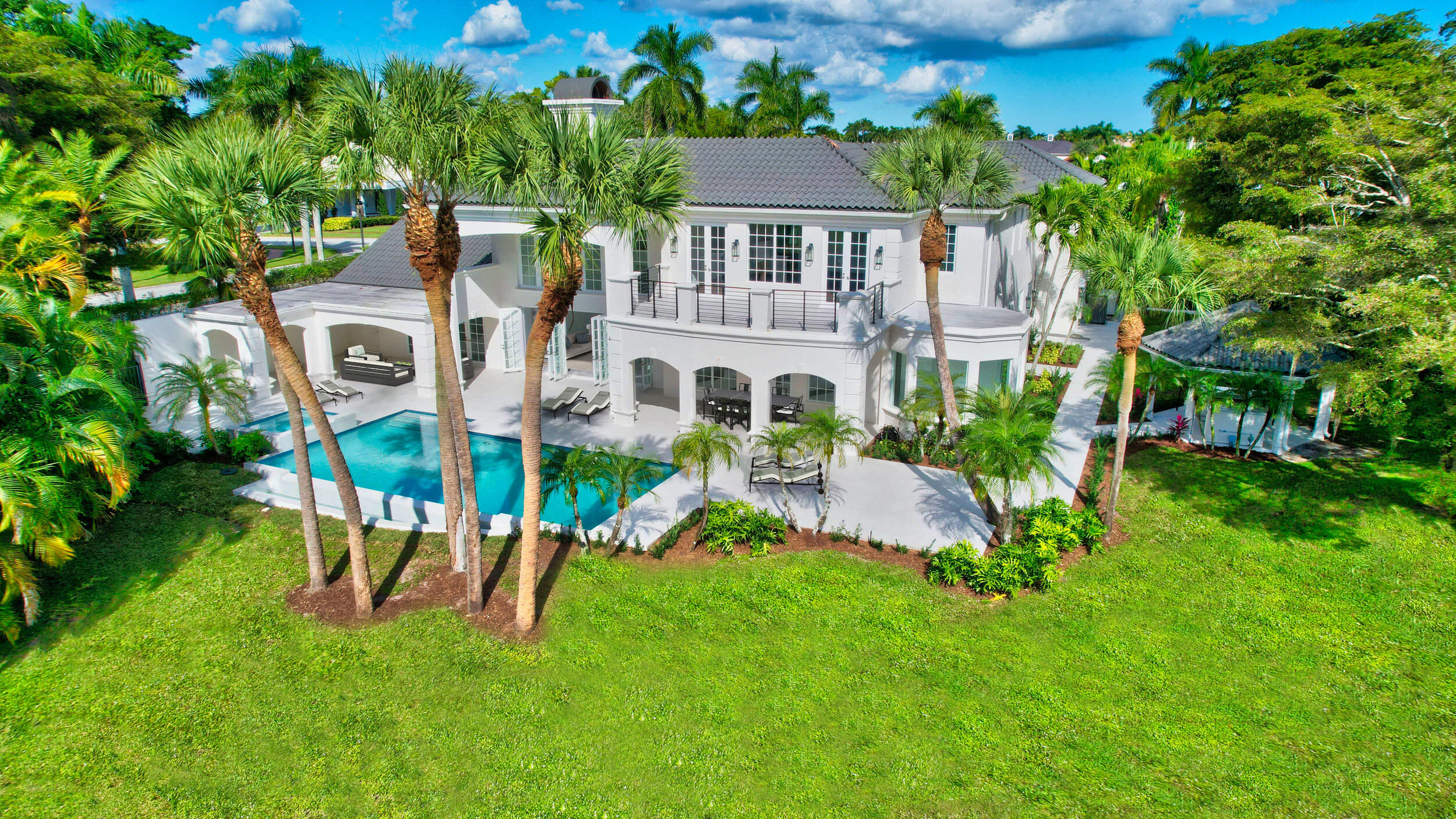 Fully renovated 7-bedroom, 8-bathroom home located on an oversized lot (0.57 acre) with long lake views, on one of the best streets in St. Andrews CC! The home features all hurricane impact windows and doors, new flooring throughout, new imported custom-made Italian kitchen with 72' Sub Zero fridge & freezer, Wolf double ovens & gas cooktop. 2nd floor has a master bedroom with a private balcony, his & her walk-in closets, wet room with rain shower & soaking tub, 2 W/Cs, spacious loft plus 2 ensuite bedrooms. 1st floor has 4 ensuite bedrooms, including a spacious VIP suite with a large walk-in closet. New driveway with marble pavers, backyard completely redone with new pavers, infinity pool & spa, built-in BBQ, new pool heater, pump, and much more. Note: Some photos are virtually staged.