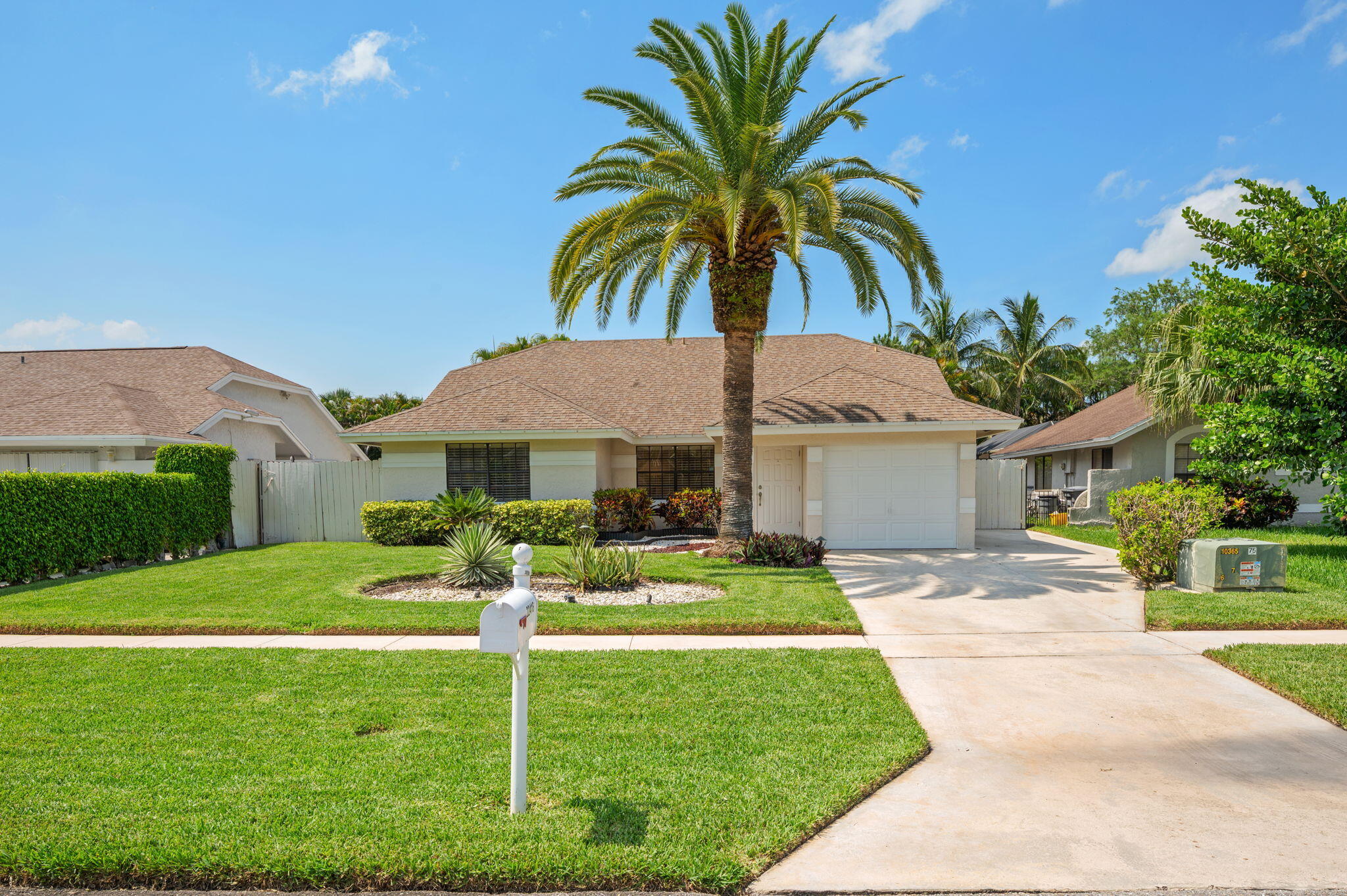 Beautifully updated and meticulously maintained 3-bedroom, 2-bath home nestled in one of West Boca's most sought-after neighborhoods. Step inside to a bright, open floor plan featuring tall ceilings, spacious bedrooms, and thoughtful updates throughout. Outside, your private retreat awaits with an oversized lot complete with a screened-in pool, custom deck, hot tub, and plenty of lush green space to enjoy year-round. A brand new roof will be completed prior to closing, giving buyers the peace of mind of a home that is truly move-in ready. Located in the highly desirable Boca Winds community, known for its A-rated schools, proximity to South County Regional Park, and easy access to premier shopping, dining, and more. Scan the QR code in the photos for the full property website, video tour,