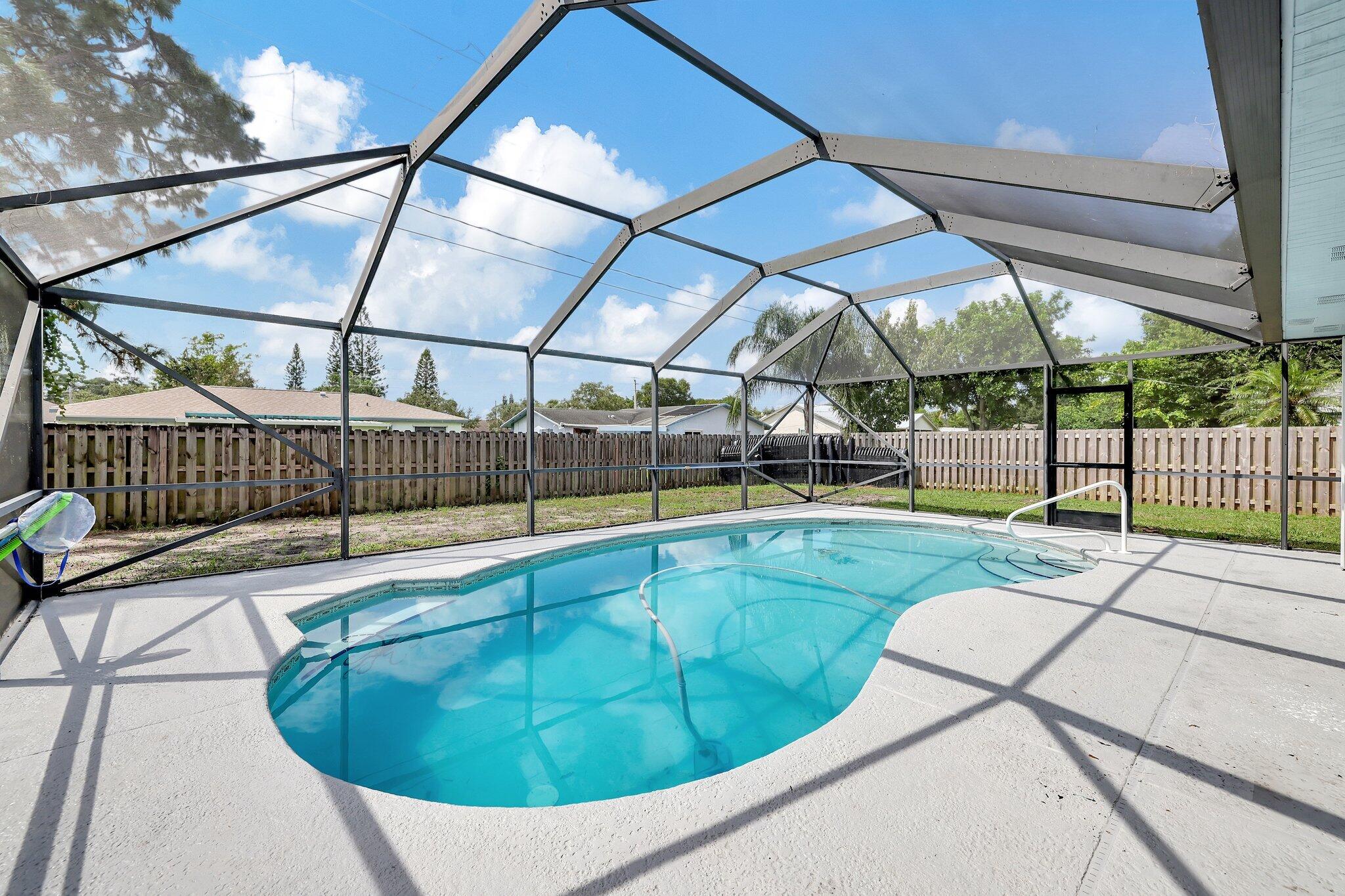 Now offered at $425,000. Income-producing pool home with a tenant in place through May 31, 2027, generating $2,950 per month from day one. Lease security includes two months' rent held as a security deposit. This well-maintained property features a 2024 roof, accordion shutters, updated interior finishes, spacious living areas, and a private pool. The split-bedroom floor plan offers privacy, while the covered patio and fenced backyard enhance long-term tenant appeal. Conveniently located near shopping, dining, parks, schools, medical facilities, and major commuter routes. Low property taxes, no HOA, and proven rental performance make this a compelling addition to an investment portfolio.