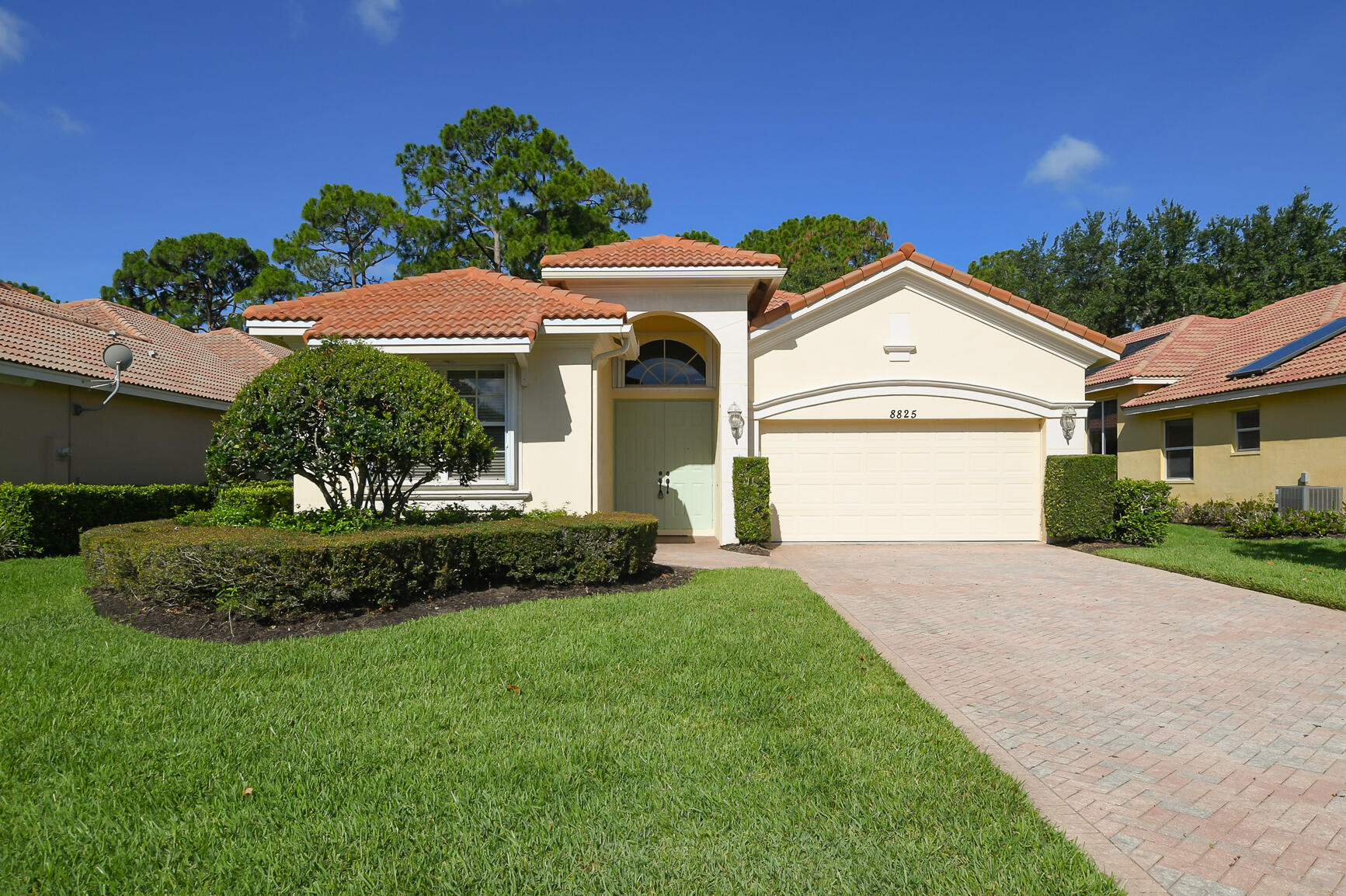 Lovely home at PGA Village on the 14th hole of The Wanamaker golf course with a BEAUTIFUL NEW ROOF. Features CBS Construction, barrel tile roof (2026) paver driveway & double door entrance. Hosts 3 Bedrooms, 2.5 Baths, 2 Car Garage & covered patio with mature landscaping & golf view. Details include volume ceilings, Split Floor plan, tile floors in main areas & Laminate flooring. Master Suite offers walk in closets & Master Bath includes Roman Tub, Separate shower & dual sinks. Eat in Kitchen with corian counter tops, pantry, stainless steel appliances & breakfast bar. Home is being sold w/ Furniture unless the buyer does not want it. Make the Move to Florida without a worry! Can also be sold turnkey. PGA Village boasts 3 golf courses open to the public or different memberships available.  Plus The Legacy course A private golf course with optional memberships available. Included with your HOA fee's is the Island Club offering something for everyone. Resort Style pool, fitness, ballroom, library, card rooms, craft room, billiards, tennis, pickleball, playground, butterfly garden, clubs, entertainment & travel. Manned gated security, cable, internet & lawn care. Located on close to shopping, restaurants, doctors, hospital & even home of the NY Met's spring training. The Treasure Coast has beautiful waterways for fishing, boating & beaches. Only 45 minutes from Palm Beach Airport.