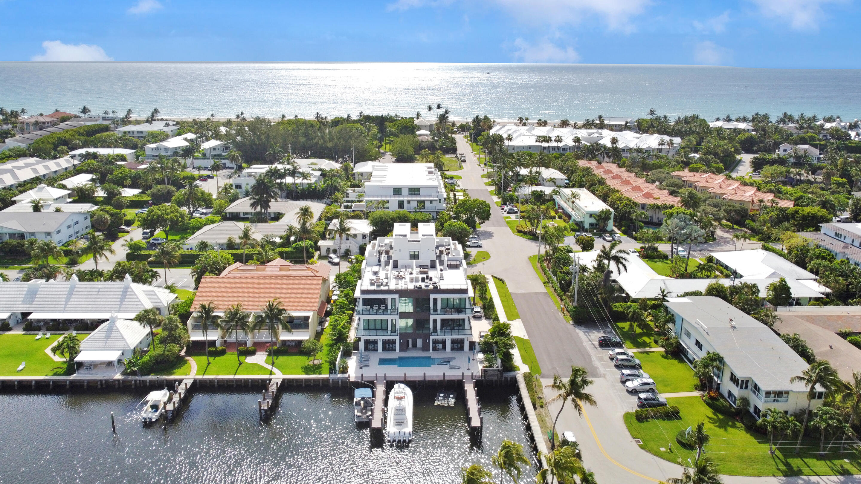 Property Under Contract Accepting back up offers. Effortless waterfront luxury awaits at Cove 4, the newest creation of acclaimed Seaside Builders, where wide cove-like Intracoastal waters provide the setting for just four single-level townhomes ideally located steps from the beach and a few blocks from exciting Atlantic Avenue. The condominium's relaxing outdoor lounge space, pool, and on-site boat slips bring an exclusive resort experience, with each residence also enjoying its own private rooftop terrace with spa and summer kitchen. Having private elevator access from the ground floor, which provides two garage spaces for every unit. This turnkey Unit is being offered Completely Furnished excluding artwork and a few exclusions.