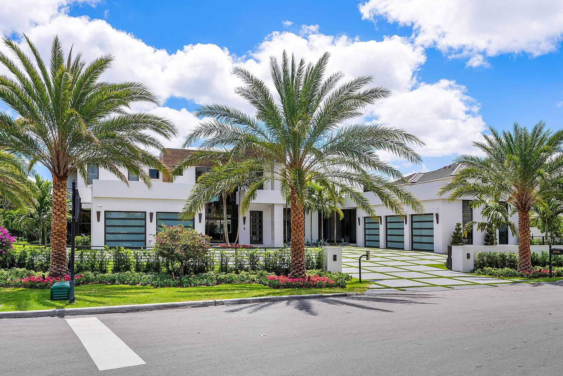 Brand New Waterfront Signature Estate built by SRD Building Corp. This exceptional property is located on a premier corner lot within Boca Raton's most prestigious community, Royal Palm Yacht & Country Club. The home is over 11,400 sf of living space and has 6 bedrooms, 8 full and 2 half bathrooms, and a 5 car garage with large gated motorcourt. South exposure with 166' of waterfrontage, fully integrated Crestron smart-home system, full house natural gas generator, and exceptional quality and craftsmanship align with every detail throughout this home. Buyer to pay documentary stamp taxes on the deed and title insurance.