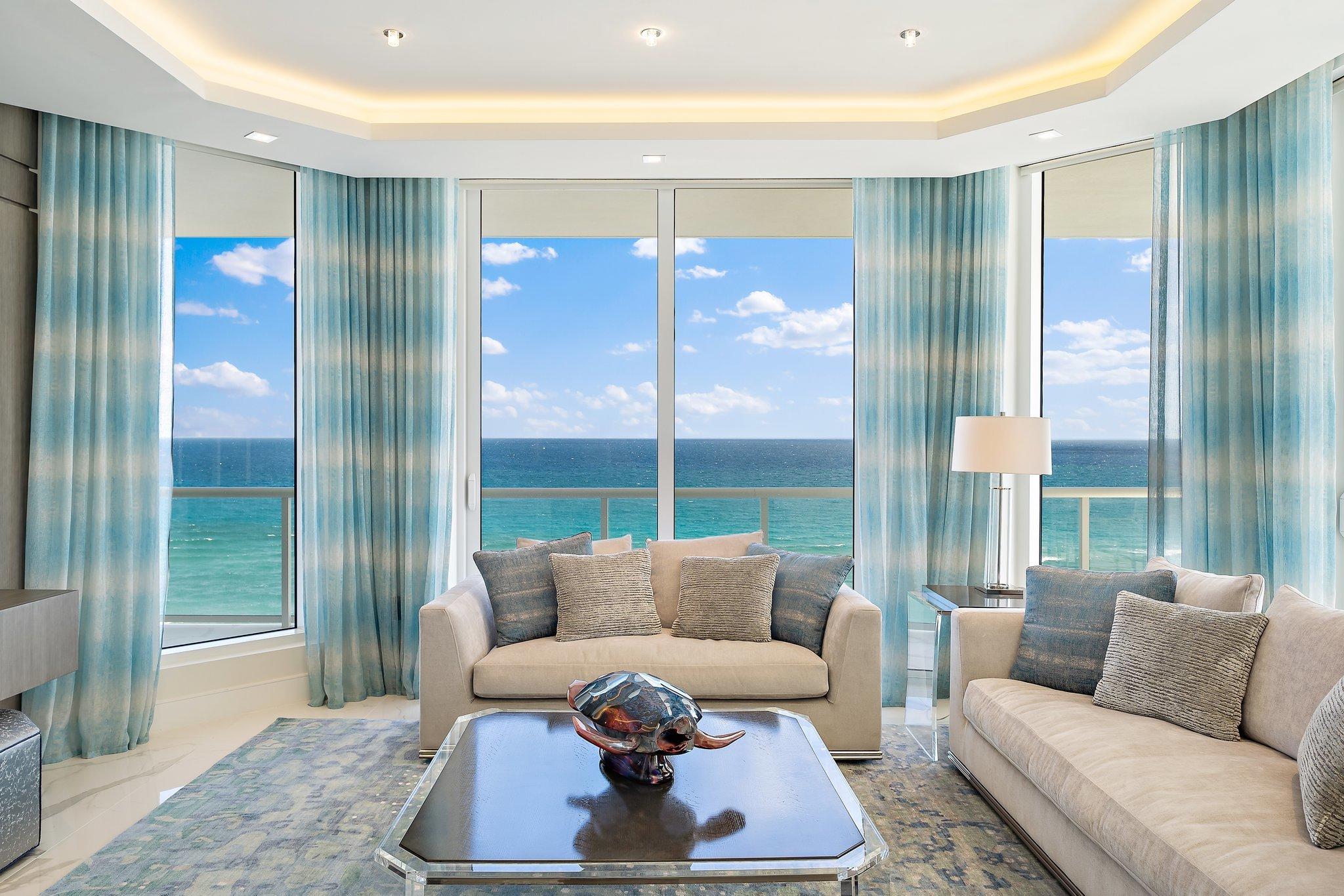 Move in for season!  This is the TURN KEY opportunity you have been waiting for! Located in Vista Blue, one of Singer Island's newest boutique luxury developments, you will love everything about this highly customized exquisite SE corner, direct ocean, 4 bed, 4.5 bath residence & the amenities this property has to offer.   No expense or detail was spared on the interior which was tastefully designed by owner & finished by Steven G Interior design.  Too many upgrades to list... Floating ceilings, custom mill work, closets, lighting & Lutron Solar shades.  Poggenphol custom cabinetry, Miele appliances, 10 foot ceilings.  2 side by side parking spaces near elevator both w/ electrical outlets for electric vehicles.  *All Art excluded from sale* Vista Blue's 5 star Amenities...see more. Unparalleled amenities & detail including gated entry w/security, on-site concierge, elevated pool/spa with ocean views, cabanas, social lounge, clubroom, board room, state of the art fitness center, men's/women's locker rooms w/ sauna, wine bar, wine storage, expansive private beach, air conditioned storage locker.