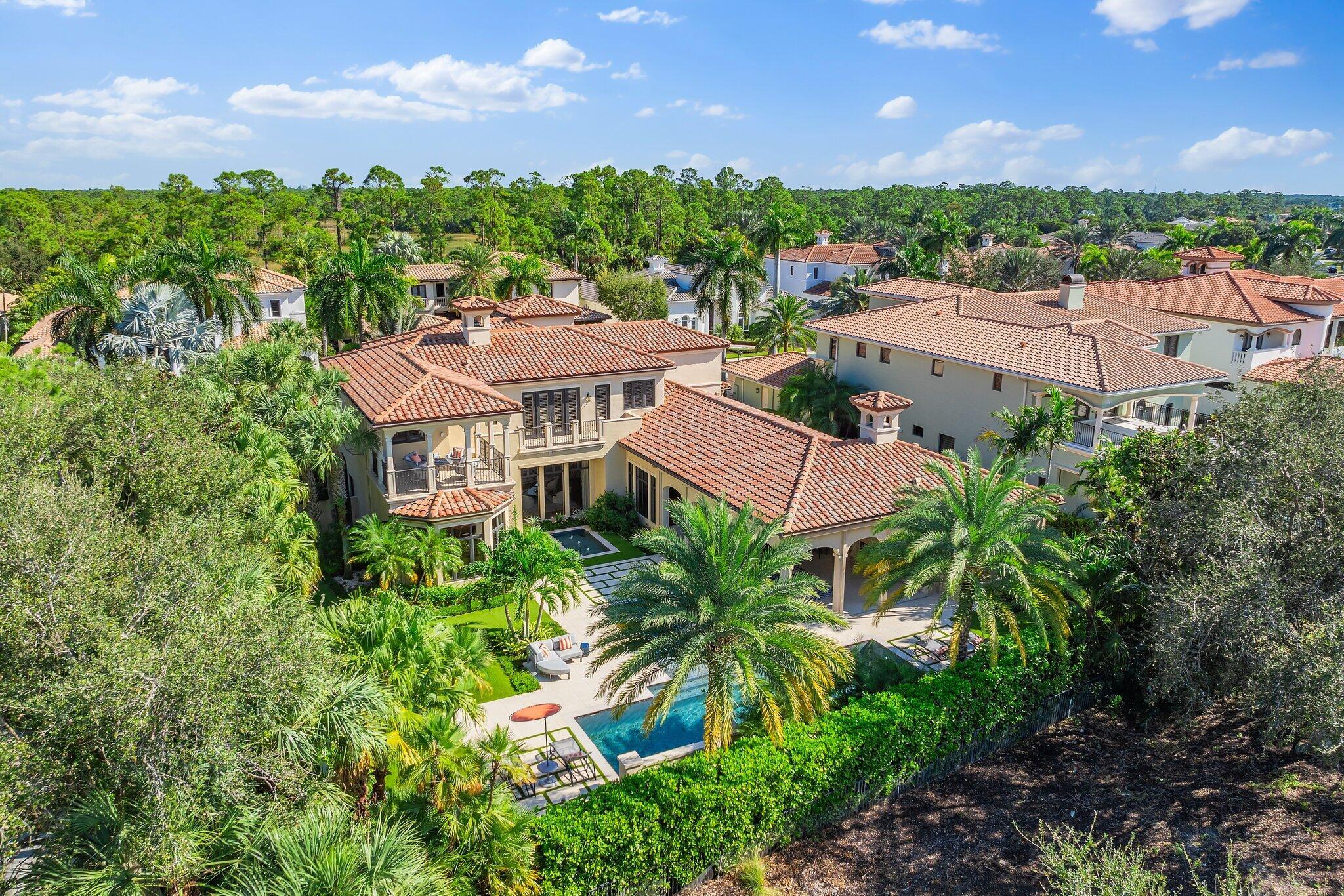 Welcome to 210 Palacio, a magnificent home in the heart of the exclusive Mirasol community. Every detail has been considered in this 6787 square foot home featuring 5 bedrooms, 6 full baths and 2 Half Baths enhanced by luxury upgrades and high end finishes at every turn.
 
Upon arrival, an expansive brick paver driveway leads you to the home's grand entryway. Step through the elegant front door for your first glimpse of all this home has to offer. The striking 2-story entry foyer with gleaming marble floors is open to the inviting Living Room just ahead. Friends and family will enjoy gathering for hors d'oevres and cocktails in this space highlighted by exquisite architectural detailing, an impressive fireplace with limestone surround and a wet bar outfitted with built-in cabinetry, plenty of refrigerator space, wine storage, a Dacor four bottle wine dispenser a humidor and an ice machine. Your company will be wowed in this room as they take in views of the backyard oasis just beyond a fully windowed wall.
 
Continue past the cozy breakfast nook with built-in banquette into the showstopper designer Kitchen that is sure to inspire any cook. It boasts top-of-the-line appliances, custom cabinetry, leathered quartzite countertops, a custom Francois & Co. pewter island and a built-in desk area. Grab a quick snack at the breakfast bar or proceed around the corner past the well-equipped butler's pantry into the elegant formal dining room where holiday dinners are sure to impress. After dinner, your guests can move on to the expansive family room featuring a finely cusom-crafted wall unit, vaulted beamed ceiling and access to the award-winning backyard designed by landscape architect Steve Parker. Prepare to be impressed by the Pebble Tec pool with summer "chiller" and spa tub, porcelain tile patio, maintenance-free turf yard surrounded by newly planted date palms and extensive landscaping with lake and club views. Simply relax here in the famous Florida sunshine, or perfect your stroke on the 440-square foot putting green.  A conveniently located cabana bath is just steps away and a fully equipped summer kitchen with Thermador grill completes this entertaining paradise and assures the perfect barbecue experience.  On a chilly night, you're sure to enjoy gathering in front of the from the newly upgraded outdoor fireplace.
 
At the end of the day, what better way to spend a relaxing evening than in your own private home theatre. Once the lights and sounds are set, sink back into the media room's eight leather theater chairs and watch the big game or the latest release on a 110-inch screen with the top-of-the-line Sony 4k projector and sophisticated sound system.
 
Ready to retire for the evening? Immerse yourself in luxury as you enter the Primary Suite with amenities worthy of the finest 5-star hotel. Here, a spacious bedroom is highlighted by beautifully crafted millwork and expansive backyard views. 
 
Enter the separate His & Hers, spa-like, marble en-suite baths each providing incomparable amenities.  The Her Bath features striking Honey Onyx countertops, tub and shower surround. Enjoy a relaxing soak in the free-standing tub, or if you prefer, step into the large shower furnished with multiple shower heads. His Bath suite features a steam shower and countertops with Emperador Spanish marble. Each bath includes a room-sized walk-in closet with custom built-ins to assure you have ample space for all your possessions. 
 
A first floor VIP guest room with en suite bath, a handsomely appointed office space and a fully equipped Laundry Room complete the first level space.
 
But that's not all...proceed upstairs via the grand staircase where you will find a cozy loft area that's the perfect place to cuddle up with a book or watch TV. Three additional bedrooms, each with new carpeting, wallpaper and en suite baths ensure privacy and comfort for family and guests alike. An additional laundry room on the second level provides much appreciated convenience as well.
 
And there's more...
Moving in will be seamless thanks to the new roof, whole house generator, new drainage and irrigation systems, mood setting landscape lighting, new side fencing with 4' wide gates and numerous additional upgrades. The whole home Savant system controls the A/V equipment, hurricane shades (no more bringing patio furniture in to store during a storm!), lighting and My2N video/conference/recording system at the front door for heightened security.
 
After viewing, you are sure to agree that no detail has been overlooked in this meticulously maintained home. Its generous interior spaces combined with its spectacular outdoor oasis and sought-after location with easy access to all club facilities, 210 Palacio is not to be missed.
o