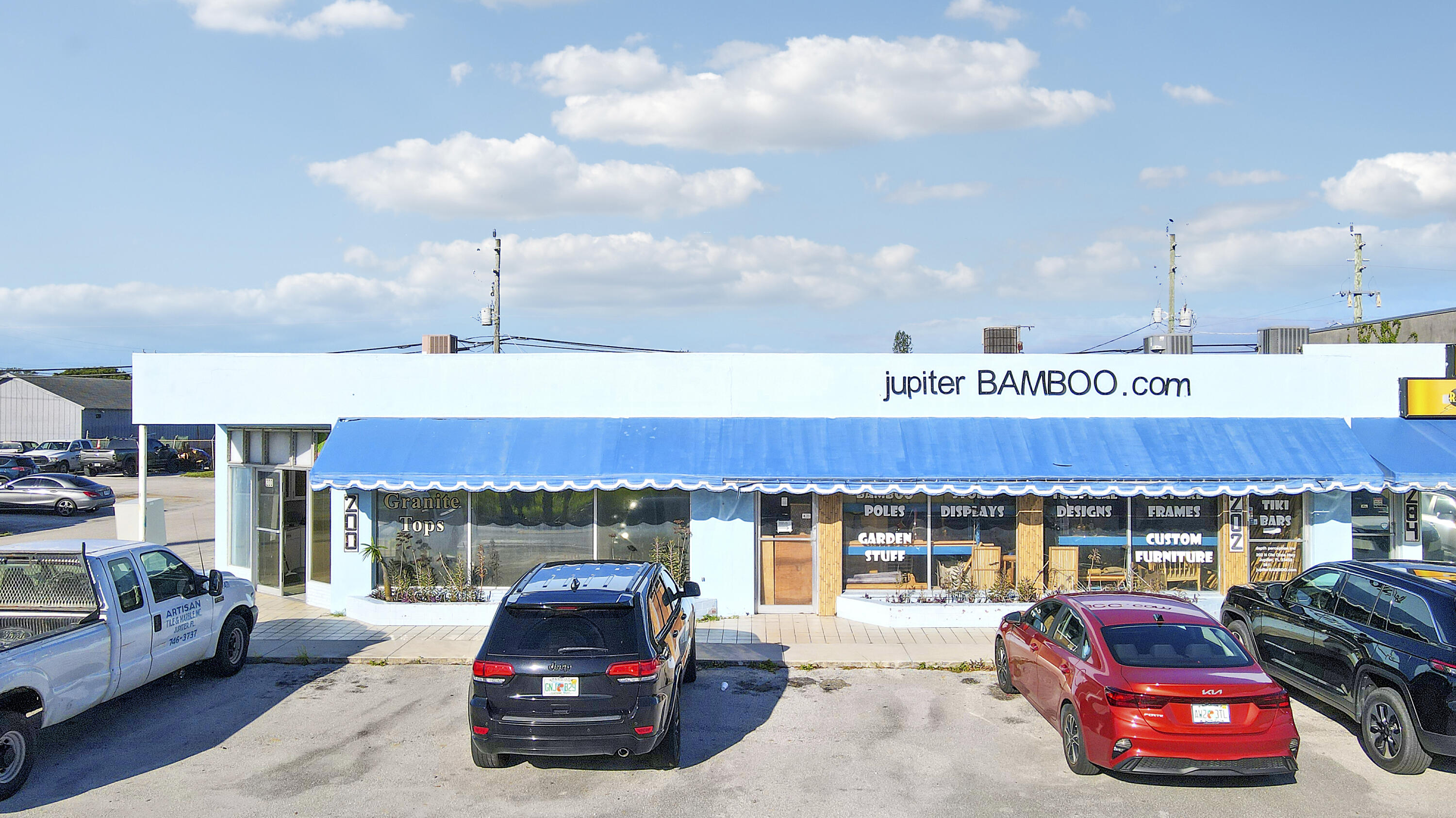 This is a rare industrial opportunity in the heart of Jupiter. 101 Fern Street offers approximately 3,950 square feet of light industrial space ideally located near major roadways and commercial corridors. The property has served as a tile and marble fabrication business since 1978, reflecting decades of established use and functionality. The building features ample parking, a fenced outdoor work or storage area, suitable for a variety of trades, fabrication, or warehouse uses. The property is currently occupied, with the business winding down operations, making this an excellent opportunity for either an owner-user or investor seeking a well-positioned industrial asset in Jupiter's limited-inventory market.